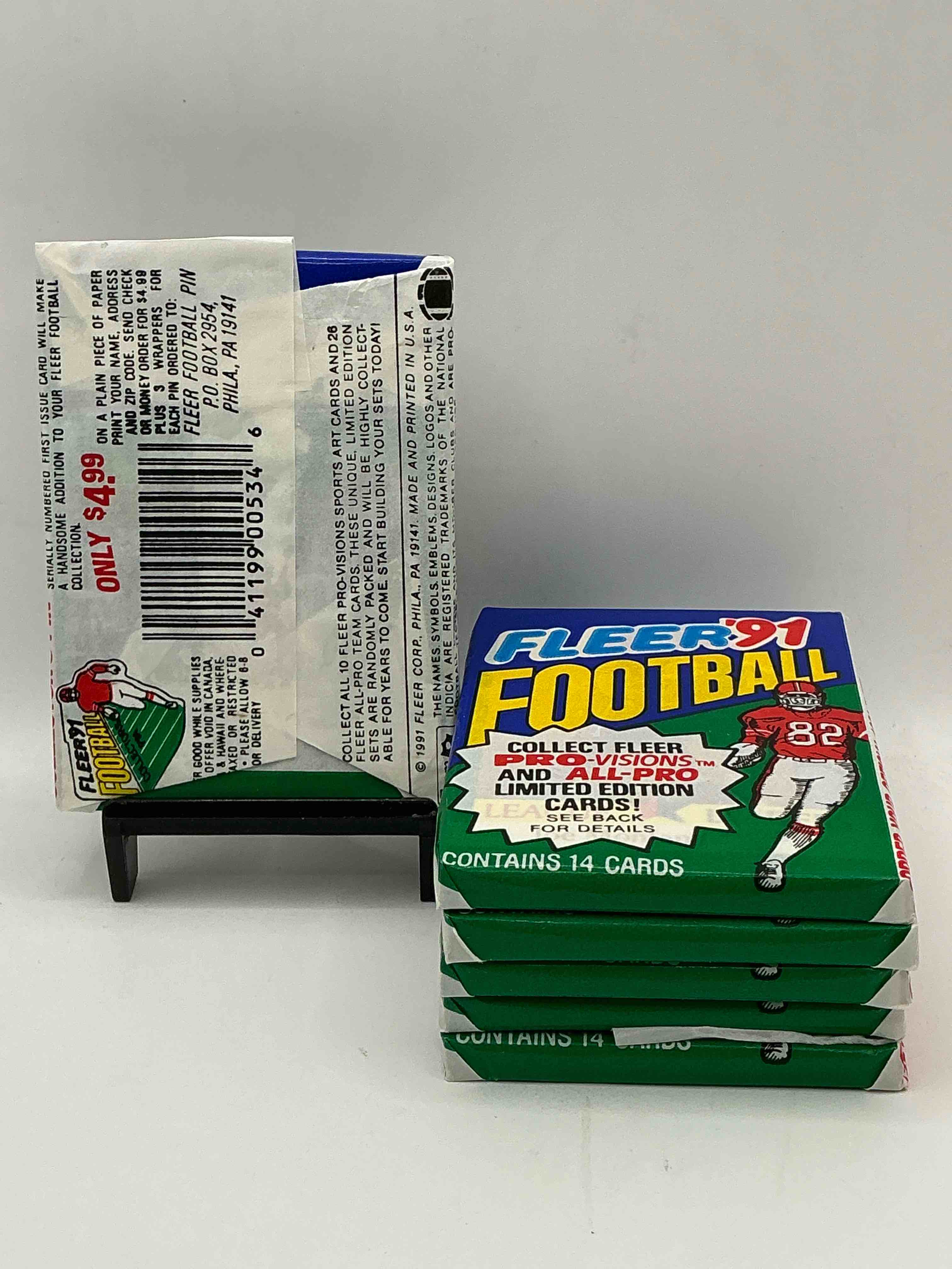 Condition photo showing New/Like New for 1991 fleer football unopened sports card wax pack, direct from original retail case. search for early barry sanders, emmitt smith, jerry rice & joe montana!