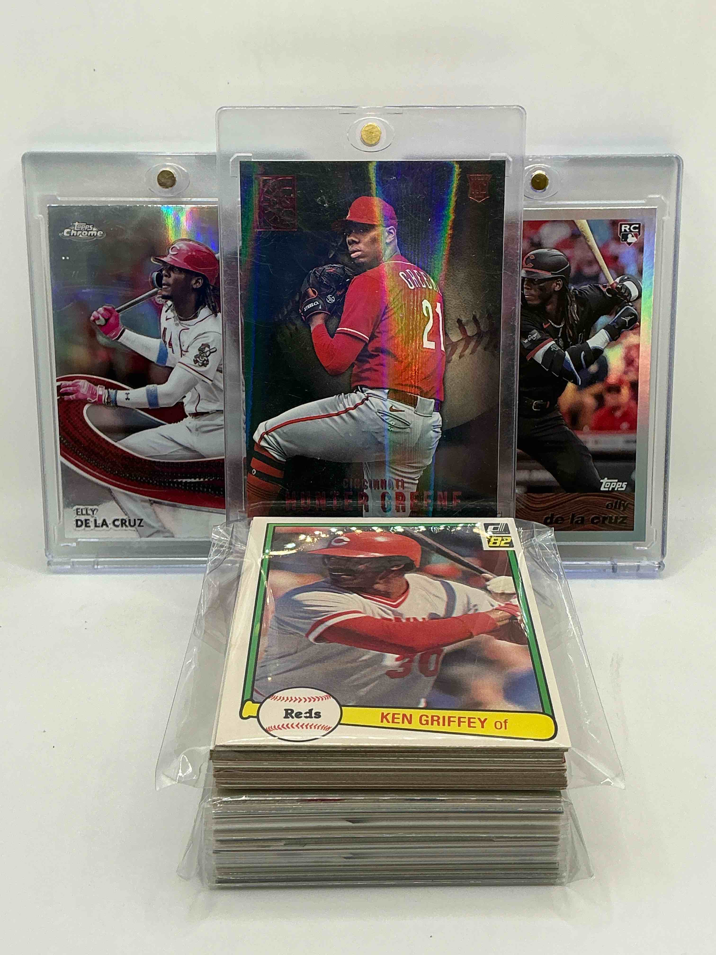 Reds Rambunctiousness! 2022 Capstone Baseball Silver Rookie Hunter Greene! 2024 Topps Chrome Silver “Strokes” Rookie Elly De La Cruz! 2024 Topps Silver “At The Break” Elly De La Cruz Rookie! Along With 50 Other Reds Heroes, Legends, Rookies & Commons!
