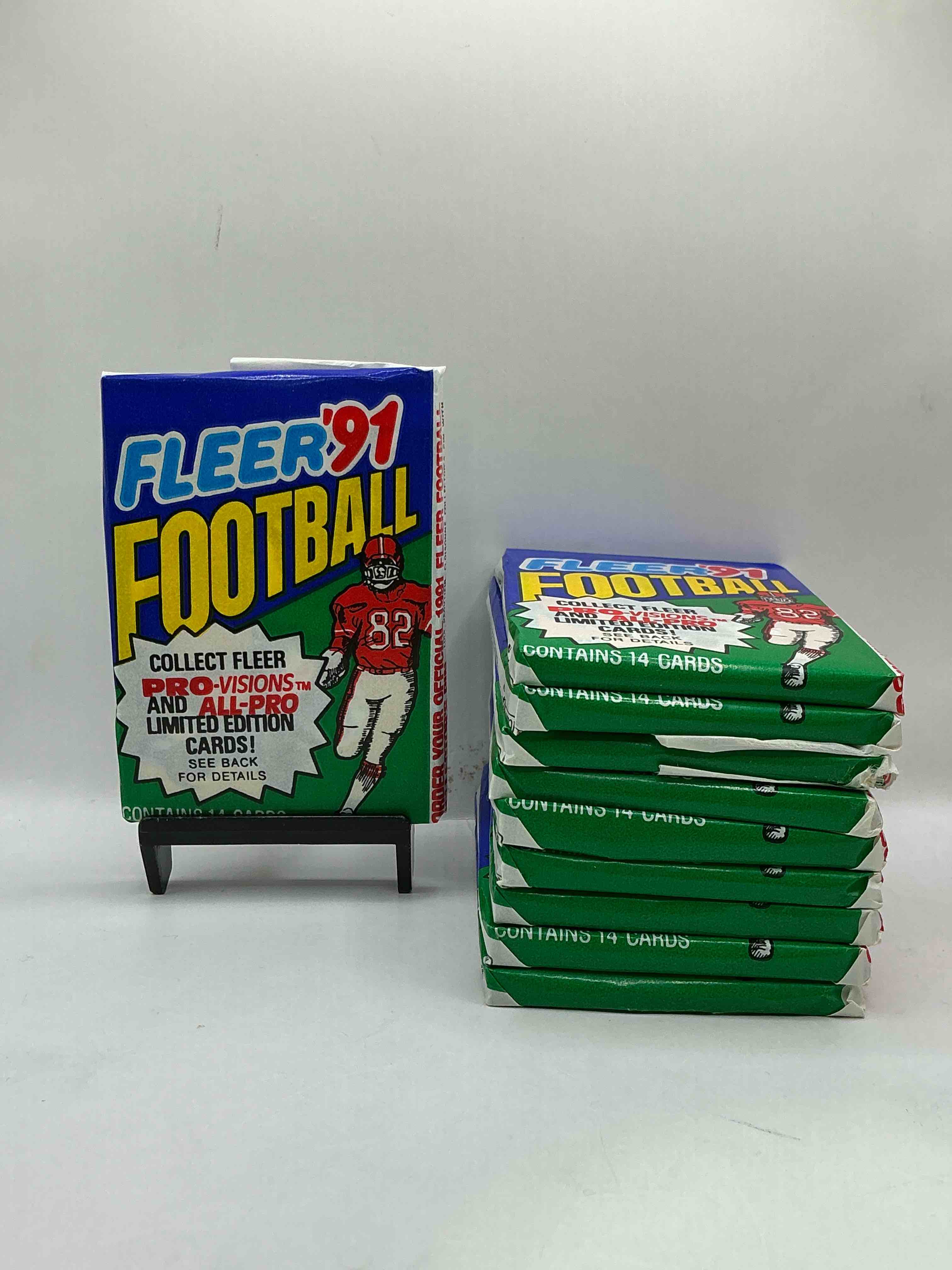 1991 fleer football unopened sports card wax pack, direct from original retail case. search for early barry sanders, emmitt smith, jerry rice & joe montana!