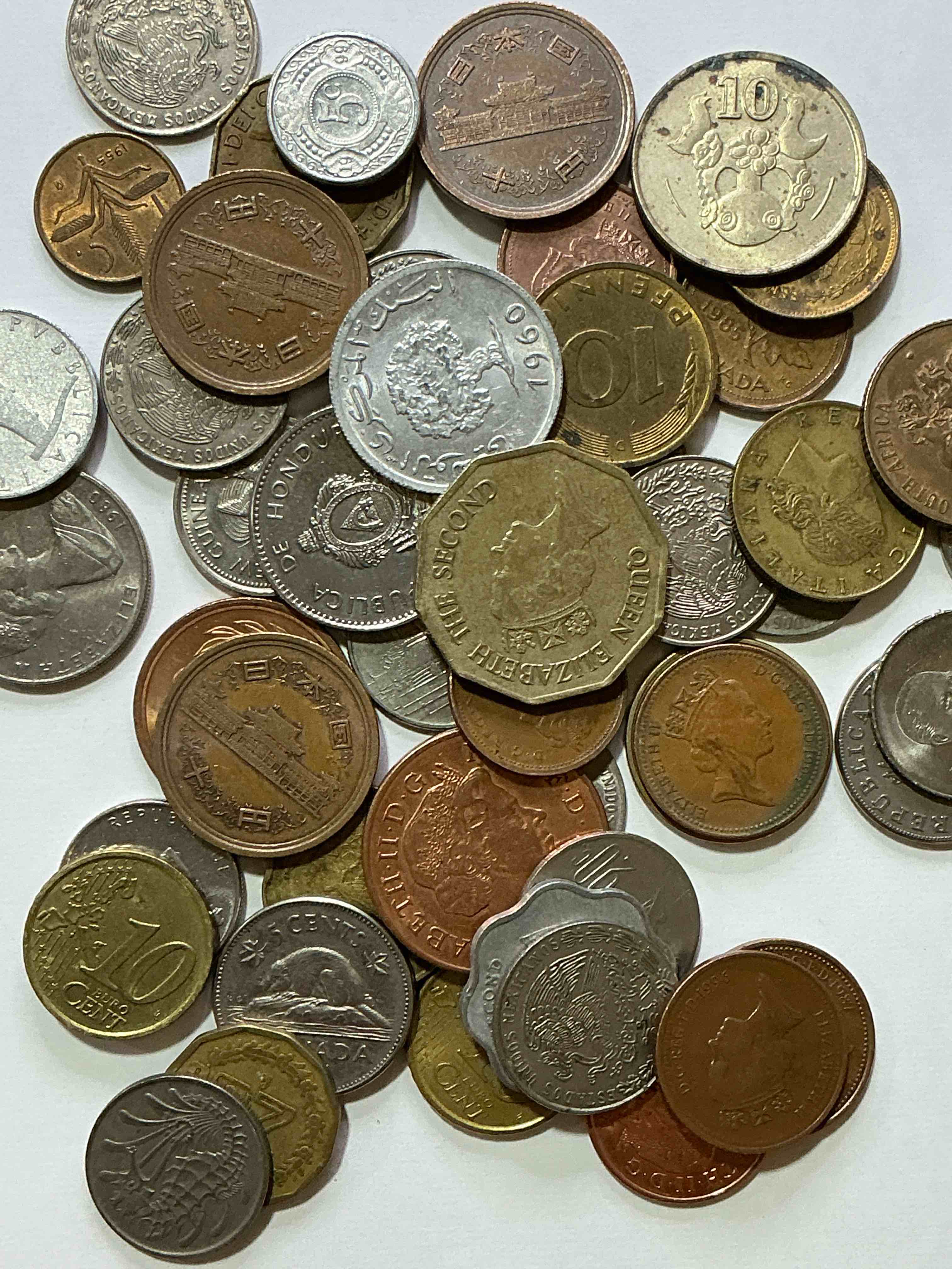 Condition photo showing Good Condition for world coins, antique & vintage! each lot is unique! many different years, countries, sizes & exotic places. this cool collection of antique coins from around the world is loads of fun! have fun identifying each coin & country as a great educational tool! a great investment too!