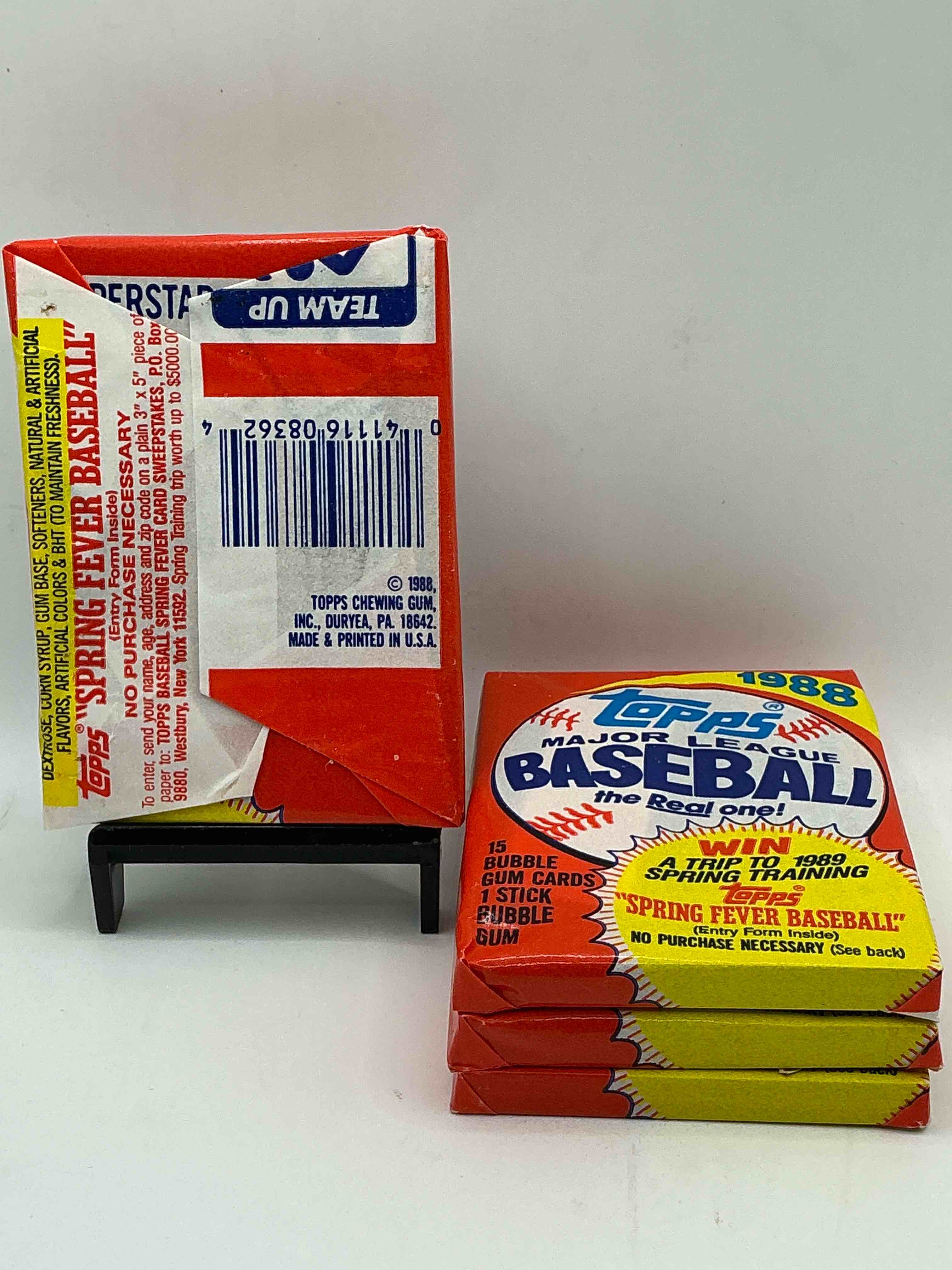 Condition photo showing New/Like New for 80's baseball fan's rejoice! 1988 topps baseball unopened wax packs full of collectible trading cards! search for valuable don mattingly "world of baseball" & nolan ryan cards worth hundreds in perfect condition!