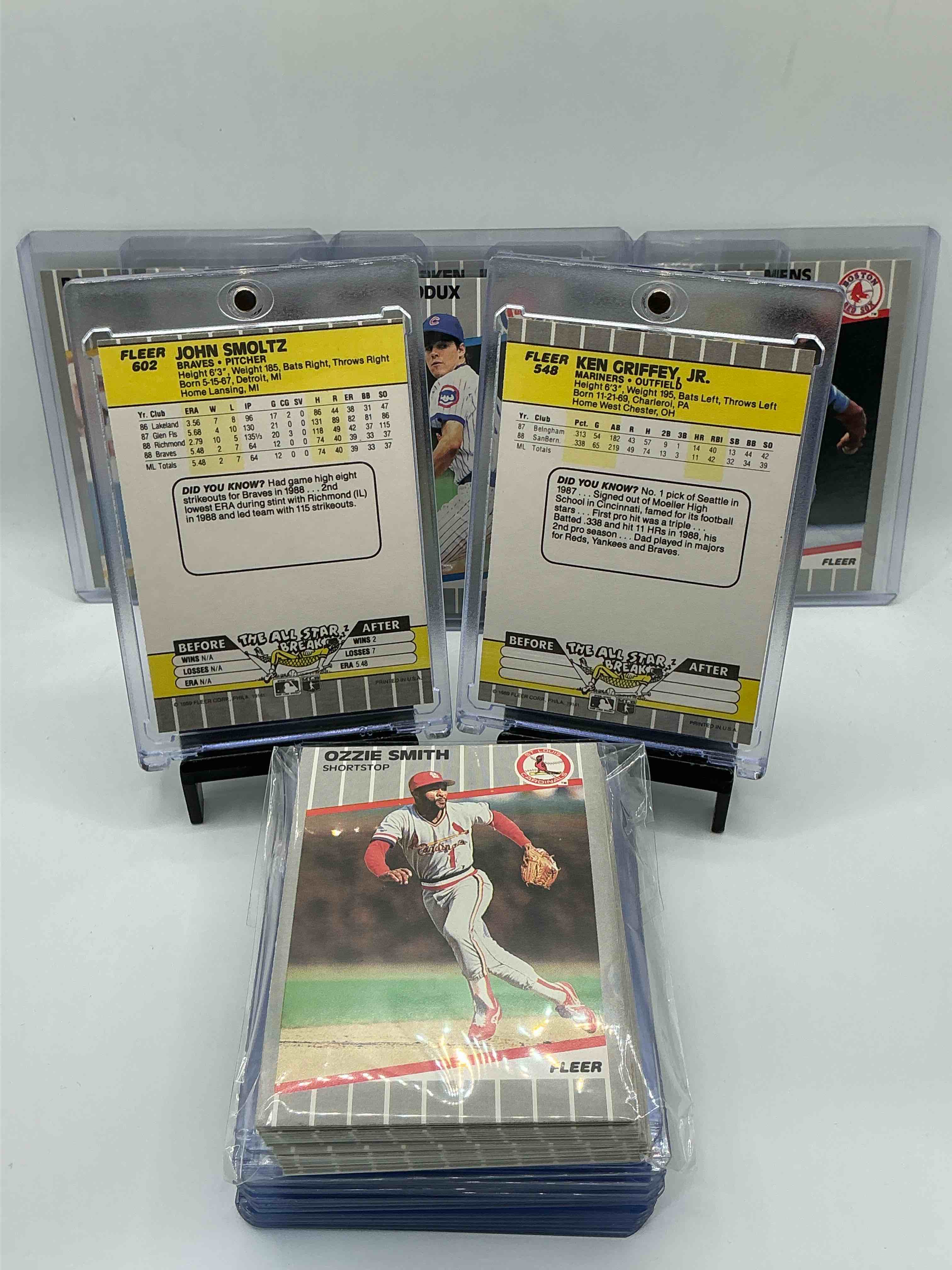 Condition photo showing New/Like New for 1989 fleer baseball! 50 card baseball lot full of legends! ken griffey jr! john smoltz! greg maddux! barry bonds! roger clemons! tom glavine! bo jackson & so many more! wow! 80’s baseball fans rejoice!