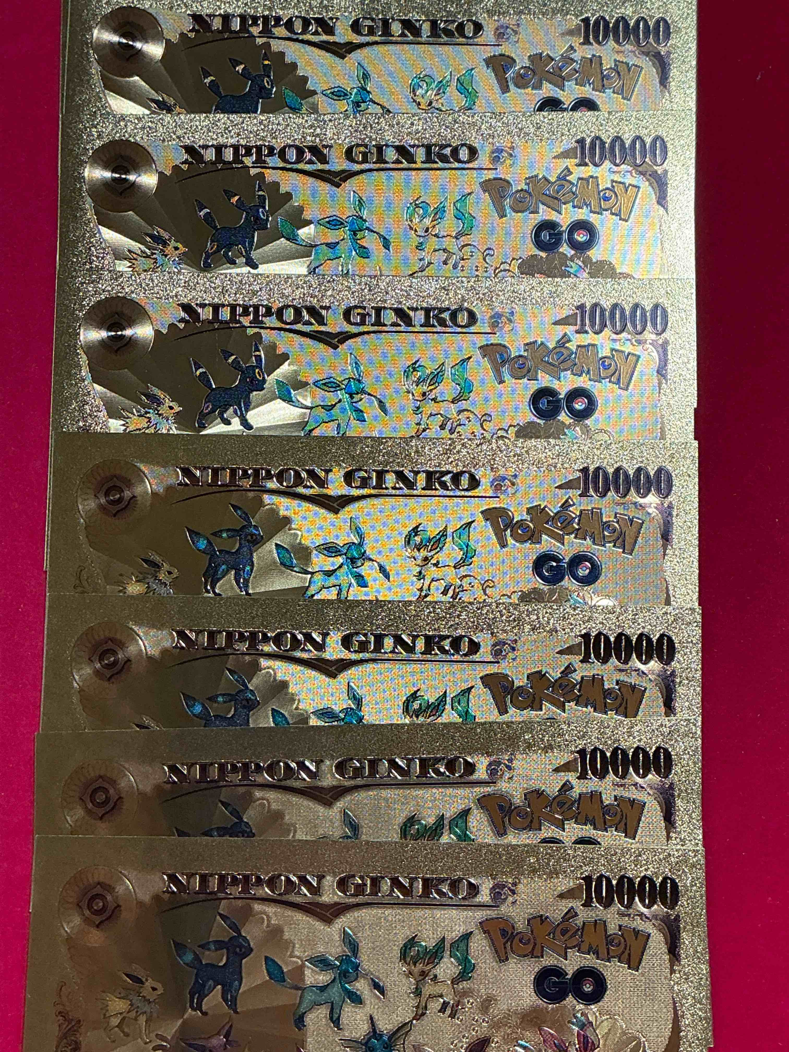 Condition photo showing New/Like New for pokémon novelty gold in this color dollars! ultra cool novelty 10,000 pokémon bill with characters & cool designs! rare & hard to get!