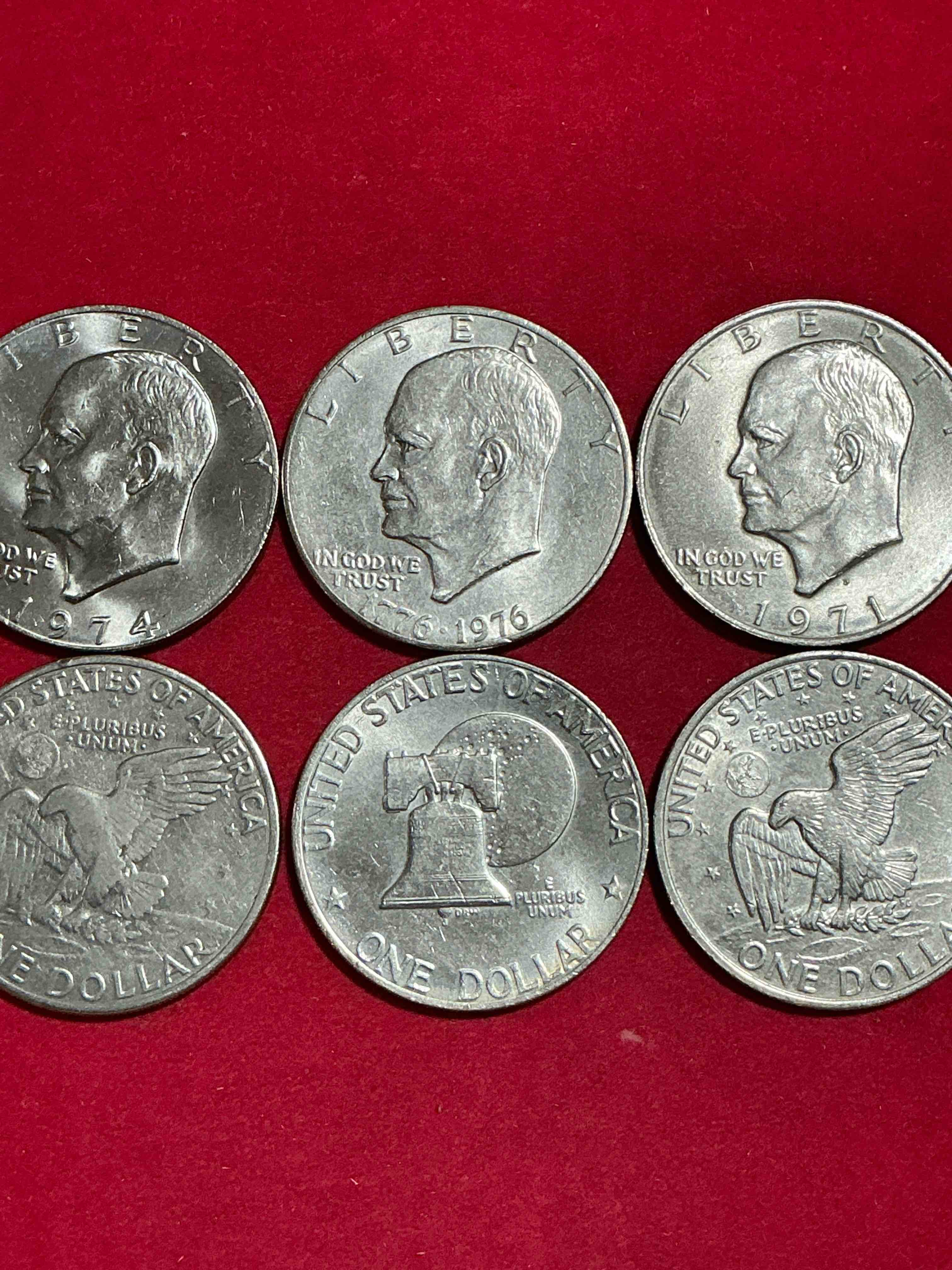 eisenhower dollars! here’s six circulated “ike” dollars! up for auction are ike one dollar coins from different years! 1976! awesome ike dollars!