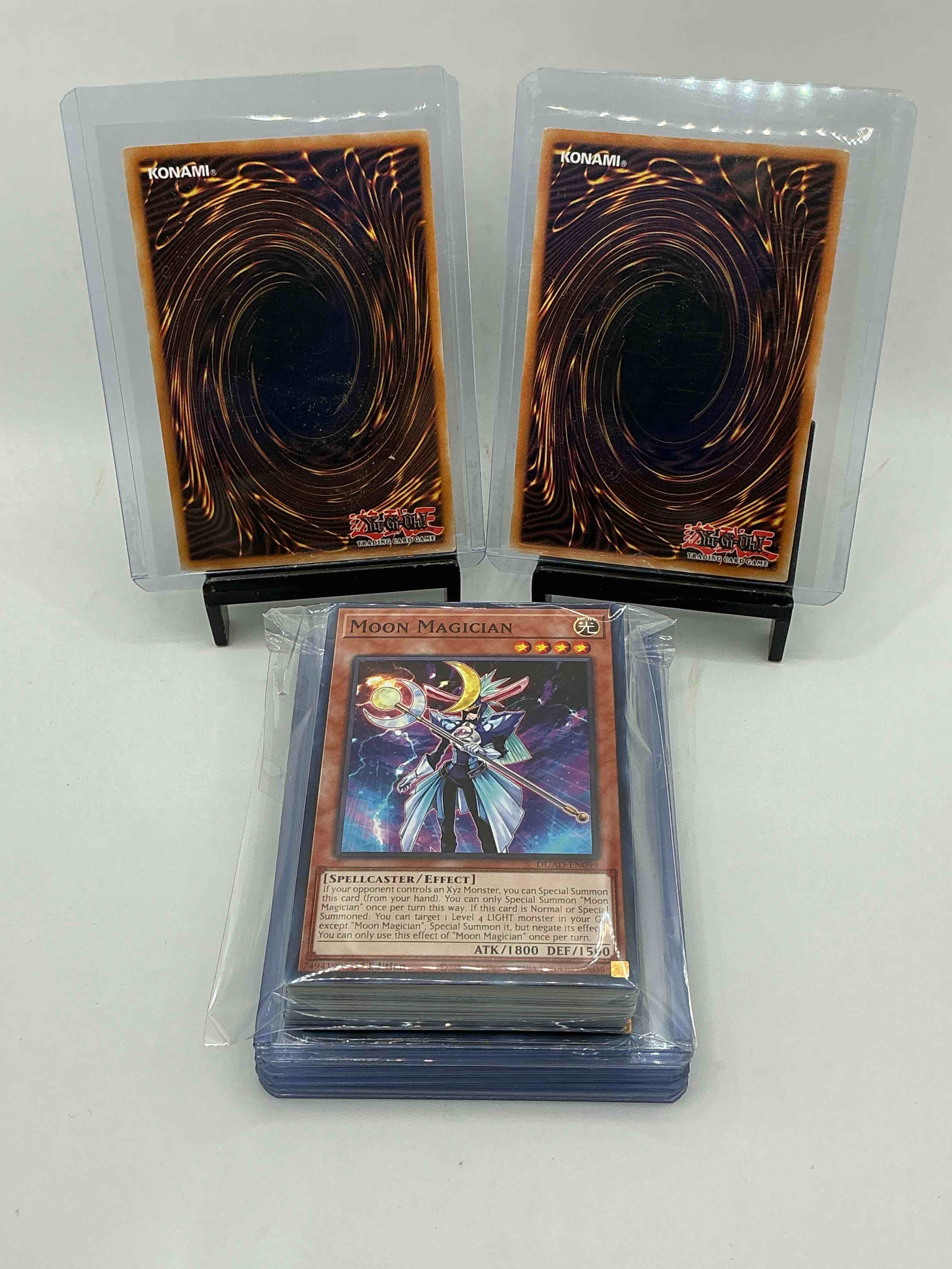 Condition photo showing New/Like New for yu-gi-oh 50 card lot! join the craze of yu-gi-oh with these awesome cards! this 50 card lot includes the big three yu-gi-oh category cards, monsters, spells & traps! this 50 card lot includes some of all three! wow! perfect time to start collecting!