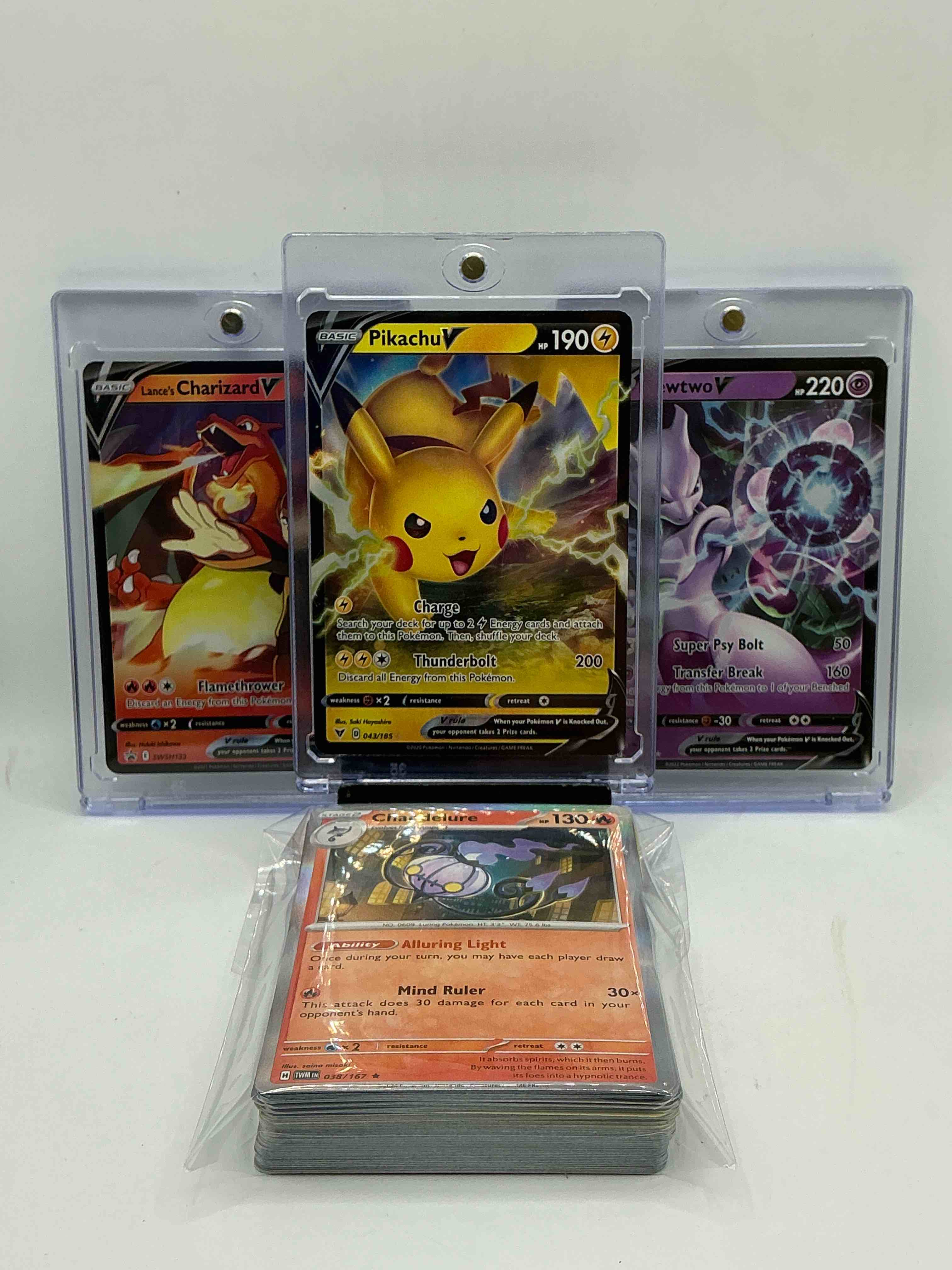 Pokémon Palooza! Lance’s Charizard V! Mewtwo V! Pikachu V! Along With 50 Other Pokémon Heroes, Holos, Legends & Commons- Including 1 Stage Two Rare Holographic, 2 Stage One Rare Holographic, 3 Basic Rare Holographic, 4 Common/ Uncommon Holographics (All Stages), 2 Stage Two Non Holographic & 2 Rares! Also Includes 36 Non Holo Common/ Uncommon Basic & First Stage Cards Trainers & Energy Too! Perfect Set For Collectors & Enthusiasts!