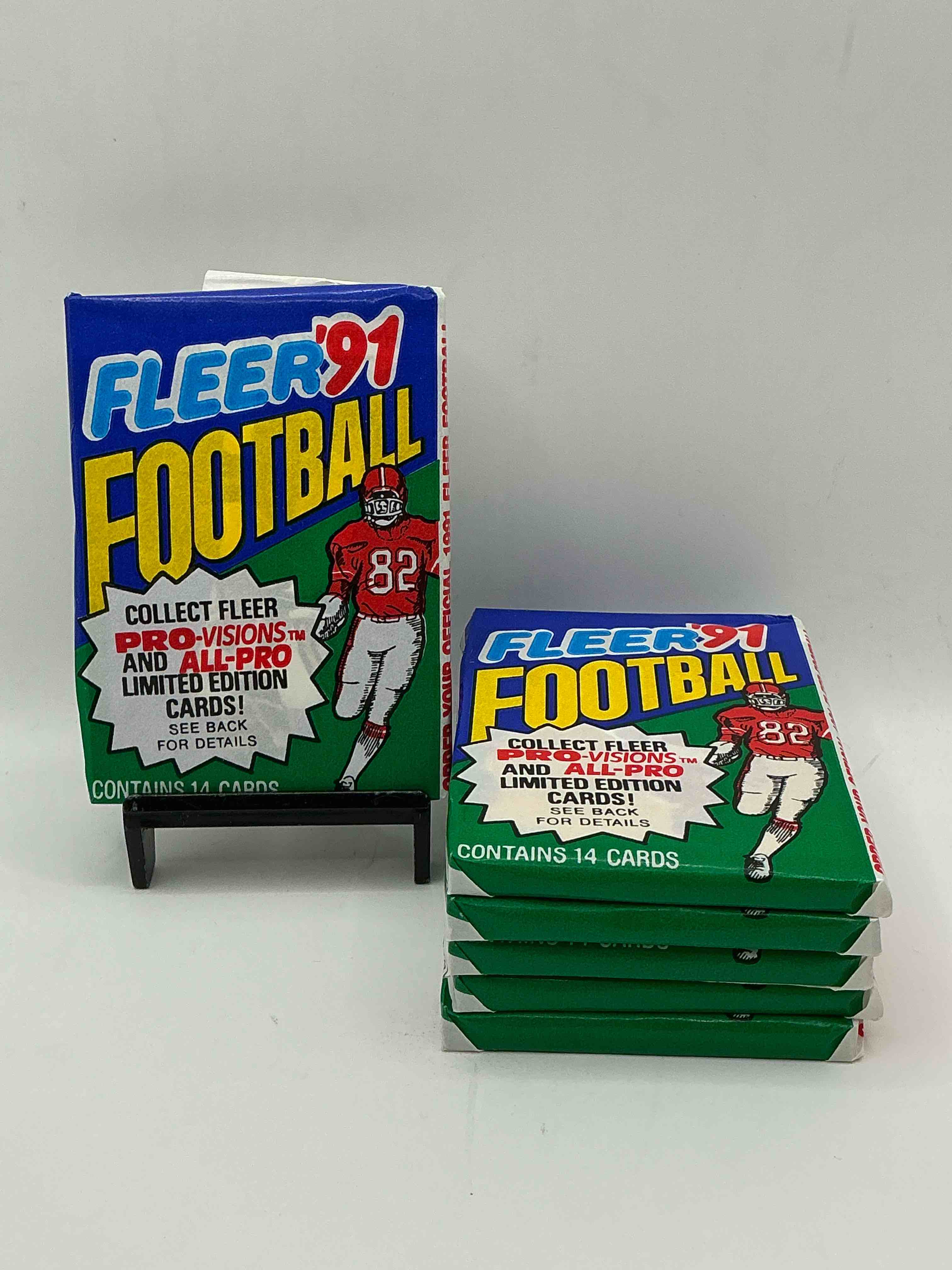 1991 fleer football unopened sports card wax pack, direct from original retail case. search for early barry sanders, emmitt smith, jerry rice & joe montana!