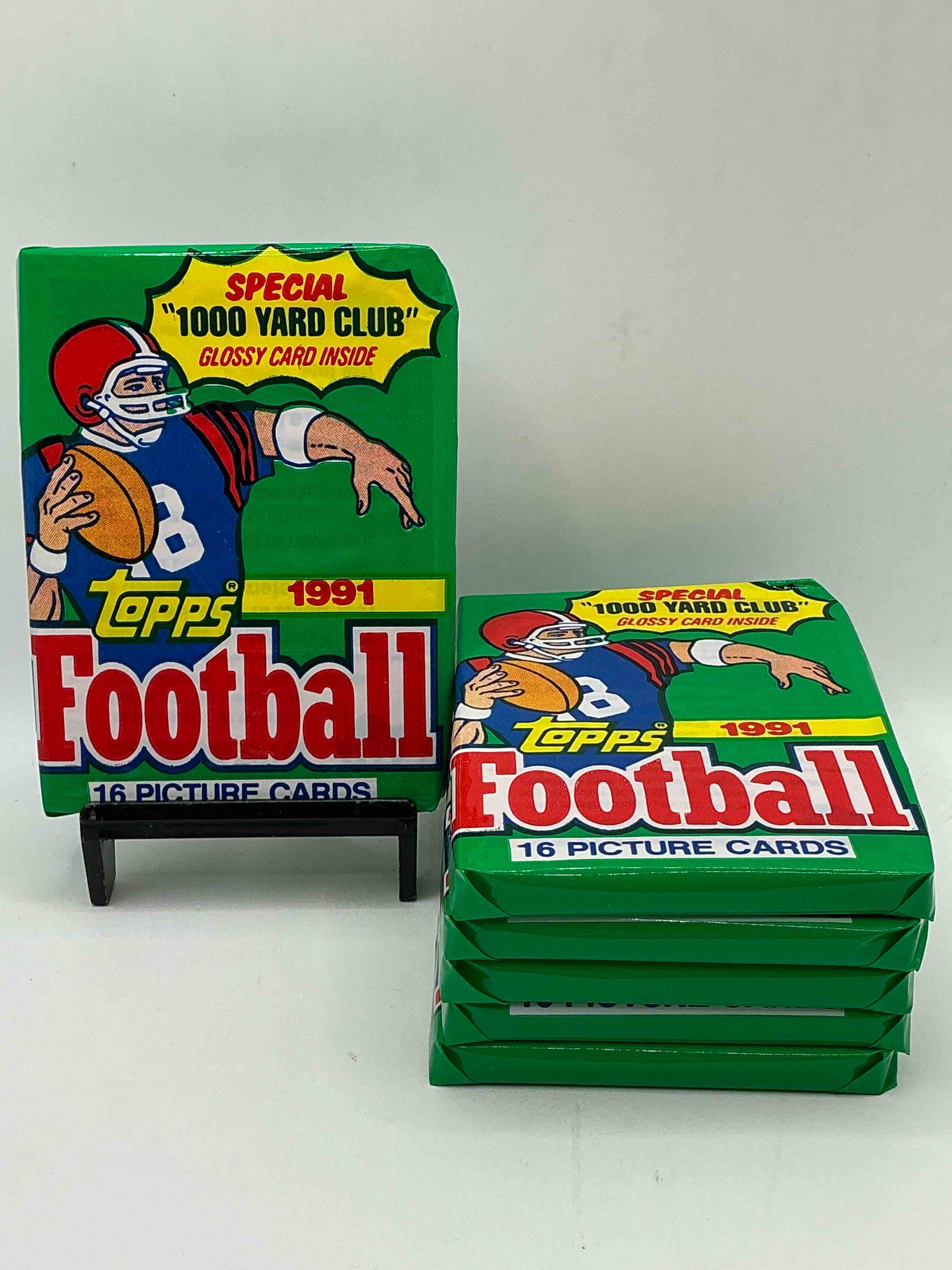 1991 topps football unopened sports card wax pack, direct from original retail case. search for early barry sanders, emmitt smith, jerry rice & joe montana!