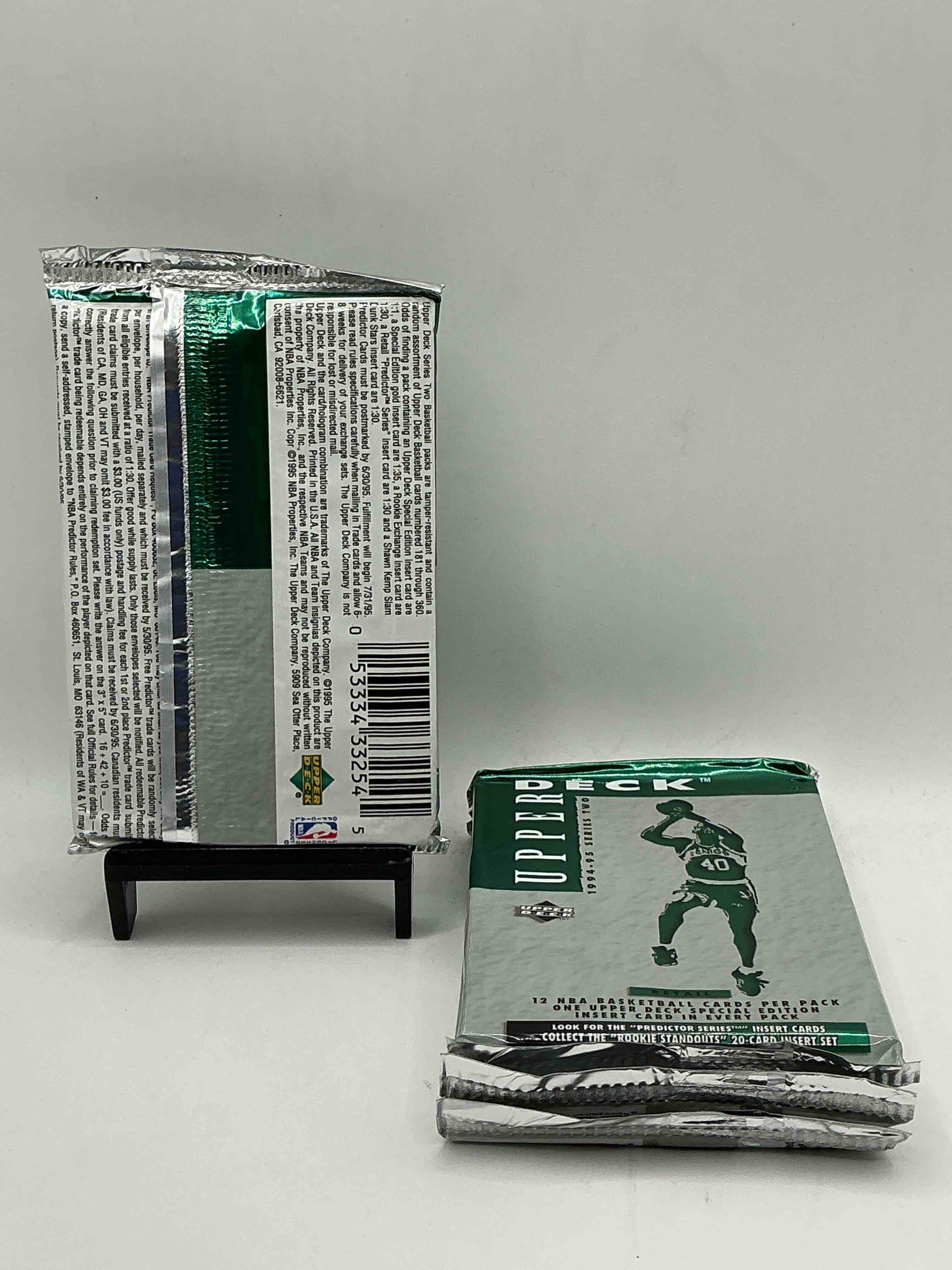 Condition photo showing New/Like New for 1994-95 upper deck series ii nba retail card packs! search for “predictor series” inserts & “rookie standouts” inserts as well! wow!