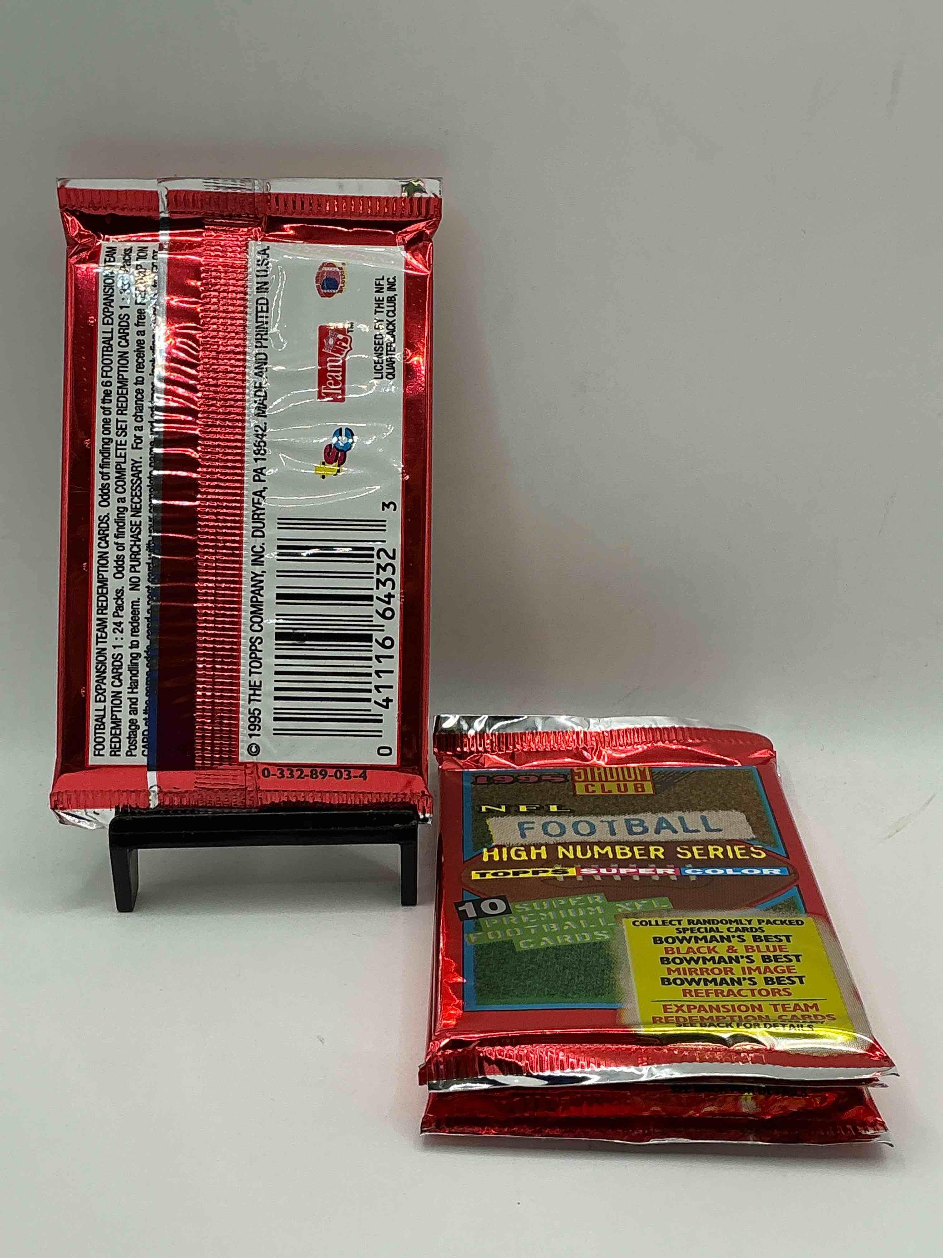 Condition photo showing New/Like New for 1995 nfl football high number series topps stadium club super color! 10 super premium nfl football cards! collect randomly packed cards, bowman’s best, black & blue, mirror image, refractors & more! rare packs!