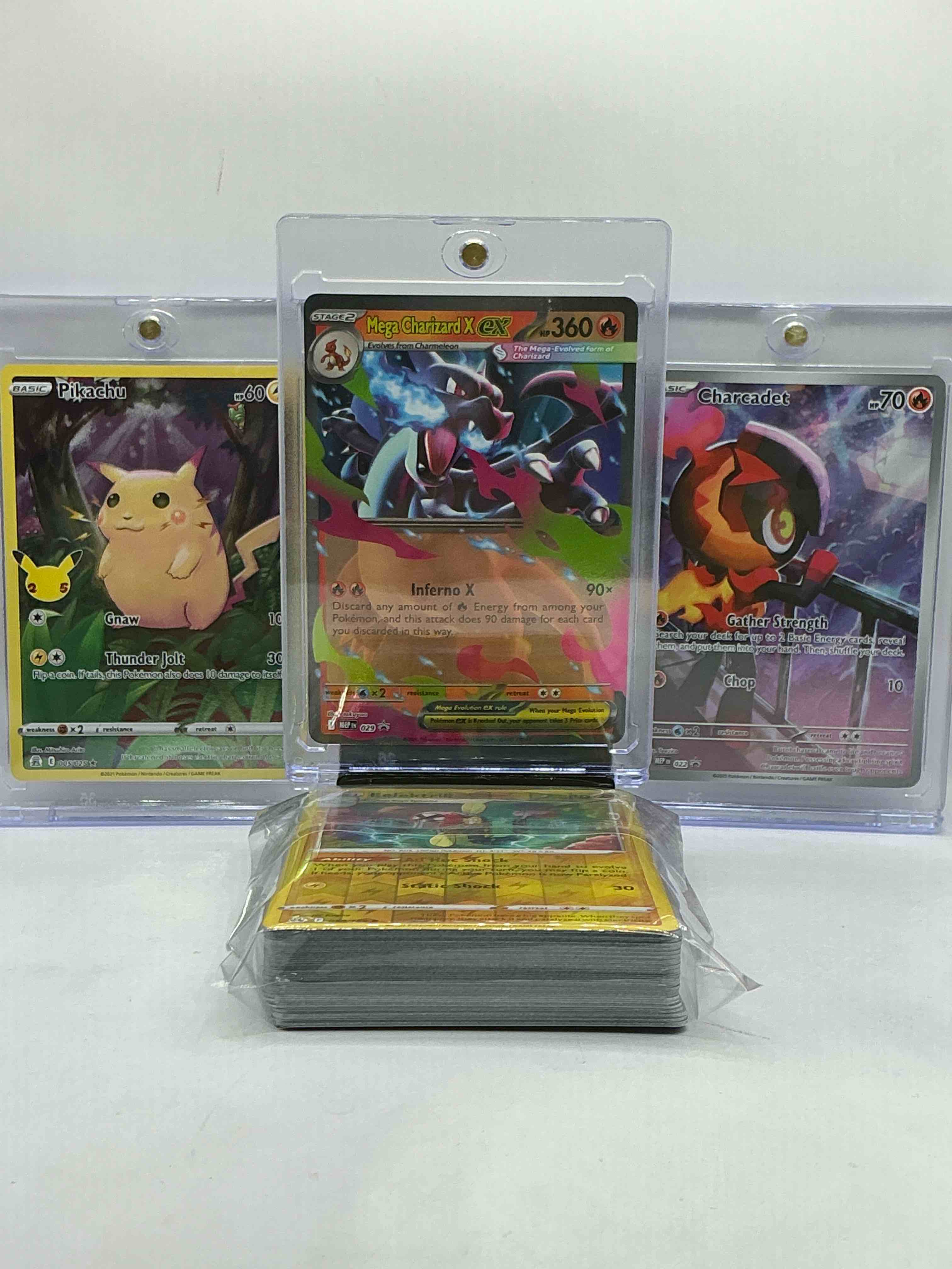 MEGA Charizard X EX, Charcadet & Pikachu WOW! Full Art! Along With 50 Other Pokémon Heroes, Holos, Legends & Commons- Including 1 Stage Two Rare Holographic, 2 Stage One Rare Holographic, 3 Basic Rare Holographic, 4 Common/ Uncommon Holographics (All Stages), 2 Stage Two Non Holographic & 2 Rares! Also Includes 36 Non Holo Common/ Uncommon Basic & First Stage Cards Trainers & Energy Too! Perfect Set For Collectors & Enthusiasts!