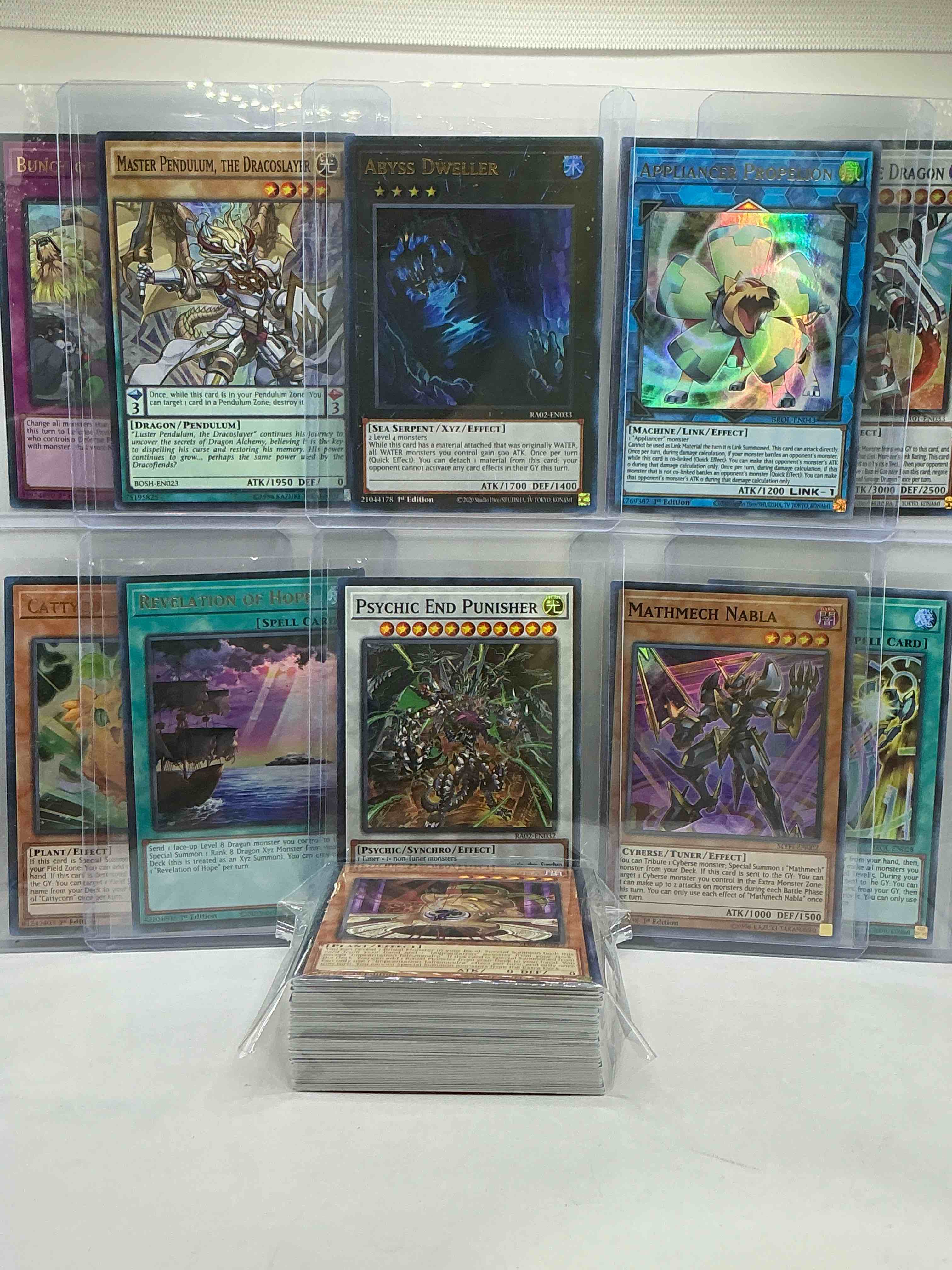 Condition photo showing New/Like New for yu-gi-oh 50 card lot! join the craze of yu-gi-oh with these awesome cards! this 50 card lot includes the big three yu-gi-oh category cards, monsters, spells & traps! this 50 card lot includes some of all three! wow! perfect time to start collecting! 