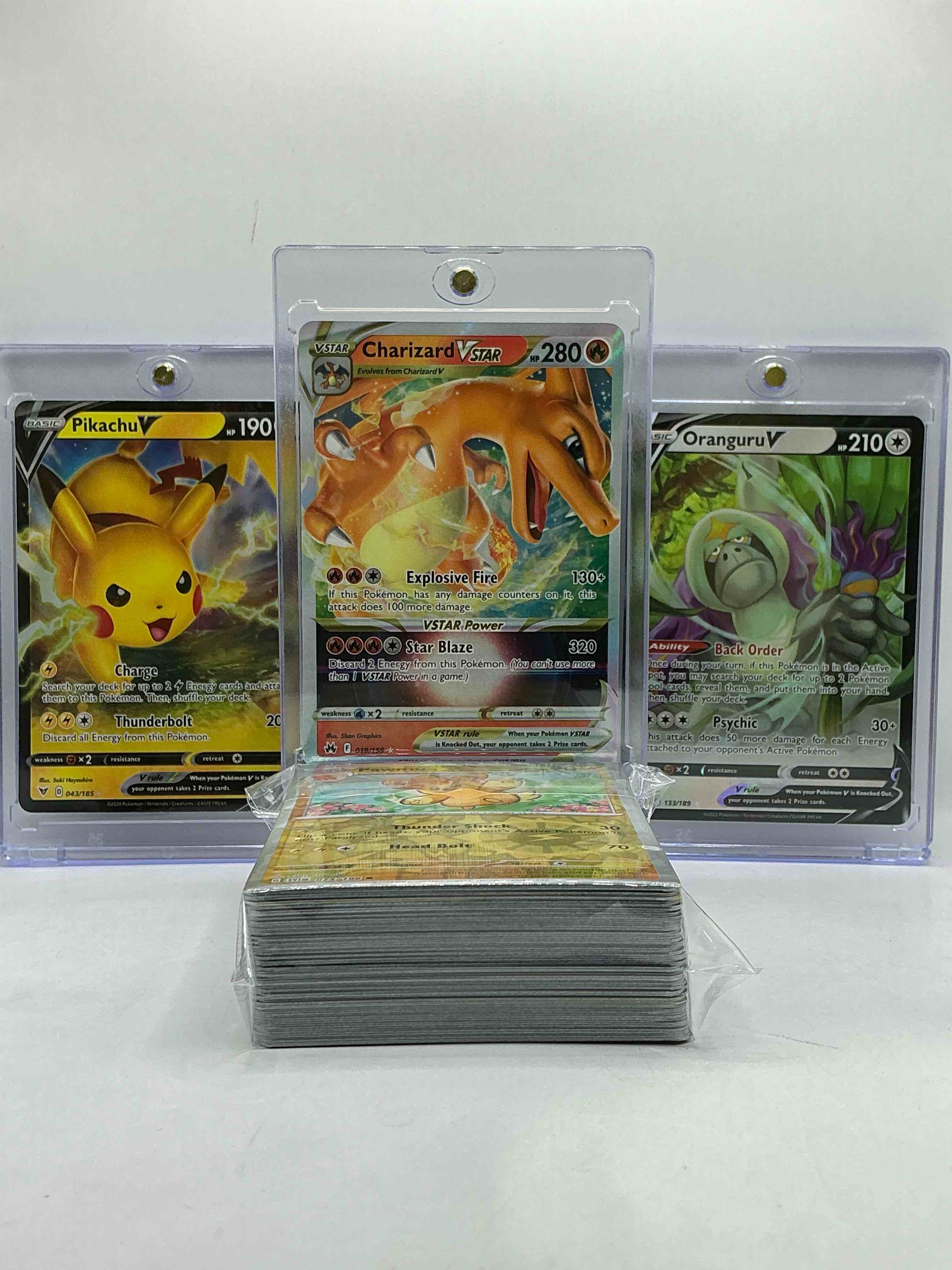 Charizard VSTAR, Pikachu V, Oranguru & More! Insane Trio, Along With 50 Other Pokémon Heroes, Holos, Legends & Commons- Including 1 Stage Two Rare Holographic, 2 Stage One Rare Holographic, 3 Basic Rare Holographic, 4 Common/ Uncommon Holographics (All Stages), 2 Stage Two Non Holographic & 2 Rares! Also Includes 36 Non Holo Common/ Uncommon Basic & First Stage Cards Trainers & Energy Too! Perfect Set For Collectors & Enthusiasts!