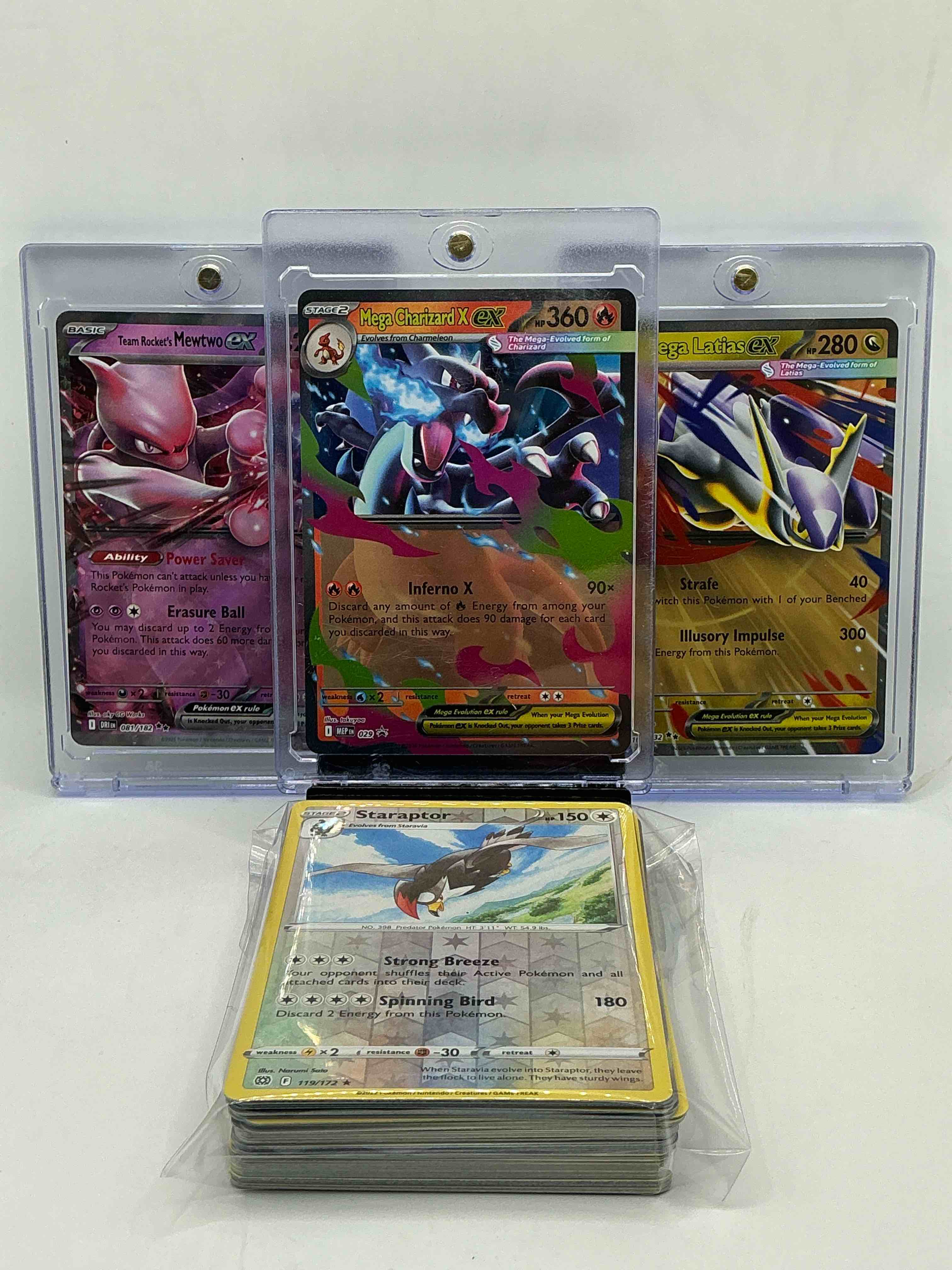 Pokémon Palooza! Mega Charizard X EX! Team Rocket’s Mewtwo EX! Mega Latias EX! Along With 50 Other Pokémon Heroes, Holos, Legends & Commons- Including 1 Stage Two Rare Holographic, 2 Stage One Rare Holographic, 3 Basic Rare Holographic, 4 Common/ Uncommon Holographics (All Stages), 2 Stage Two Non Holographic & 2 Rares! Also Includes 36 Non Holo Common/ Uncommon Basic & First Stage Cards Trainers & Energy Too! Perfect Set For Collectors & Enthusiasts!