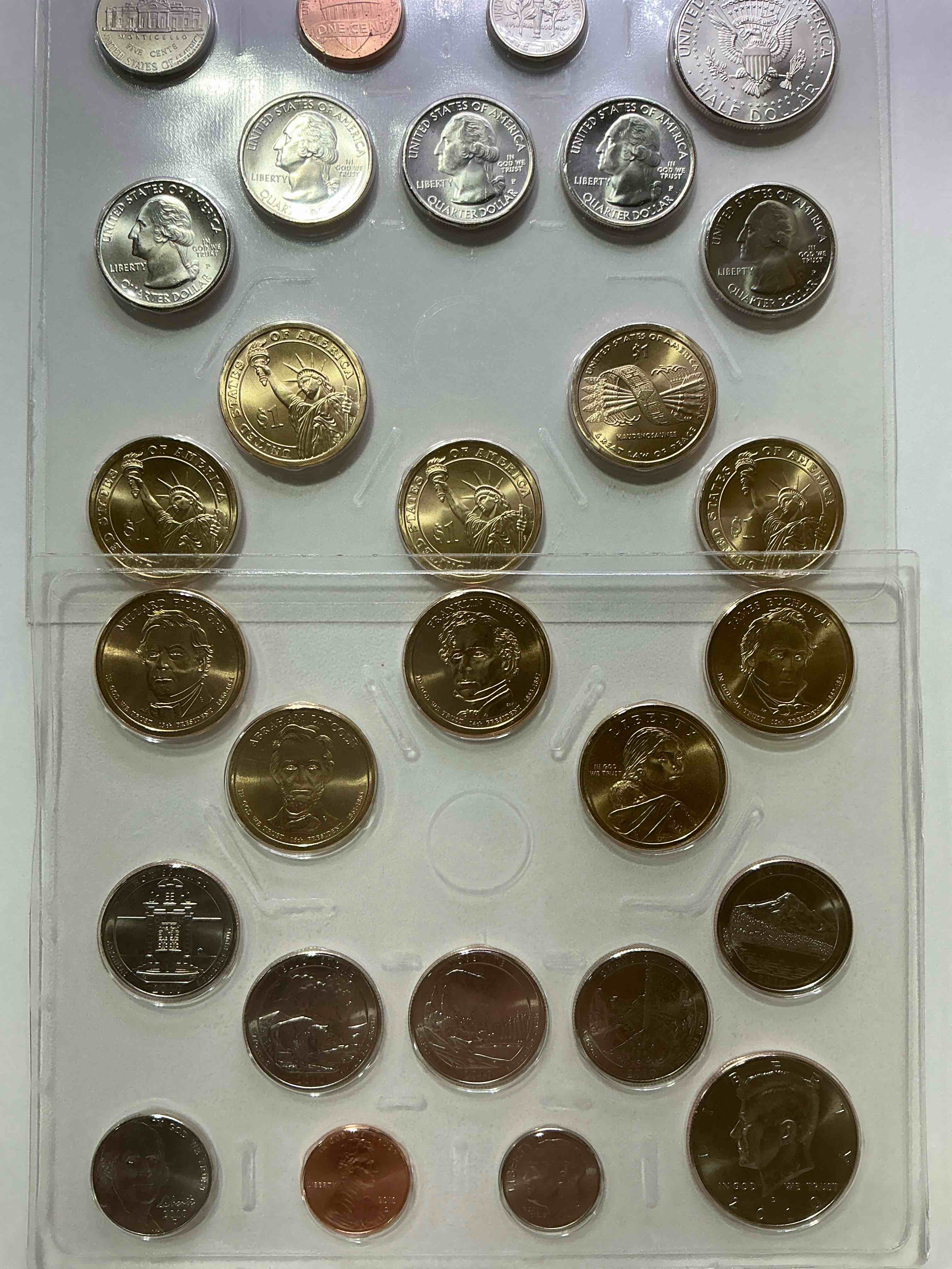 28 coin craziness! denver & philly mints! 2010 uncirculated mint set coins! includes half dollars, president dollar coins, dimes, nickels, pennies & quarters! cool coin collectible! 