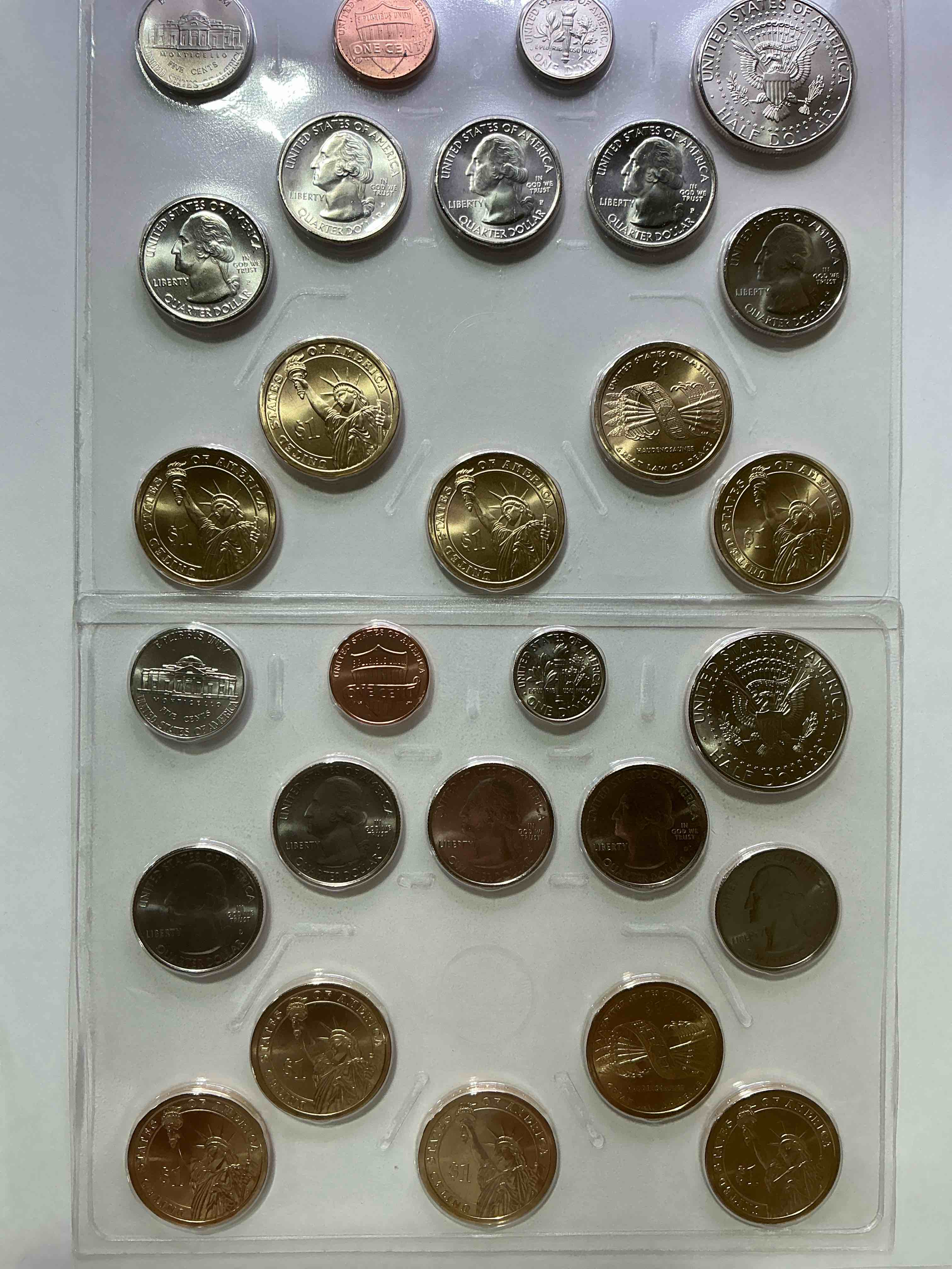 Condition photo showing New/Like New for 28 coin craziness! denver & philly mints! 2010 uncirculated mint set coins! includes half dollars, president dollar coins, dimes, nickels, pennies & quarters! cool coin collectible! 