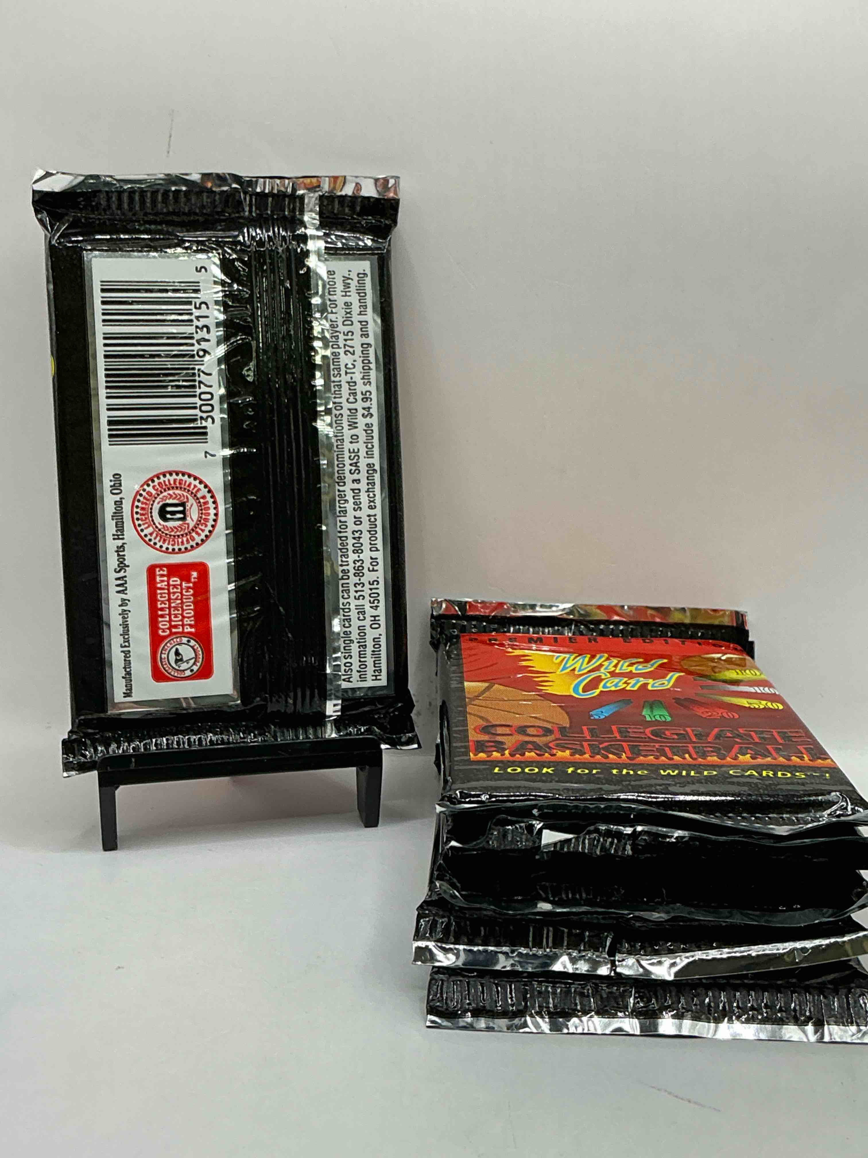 Condition photo showing New/Like New for wild card premier edition 1992 basketball card packs! look for the wild cards! basketball packs!