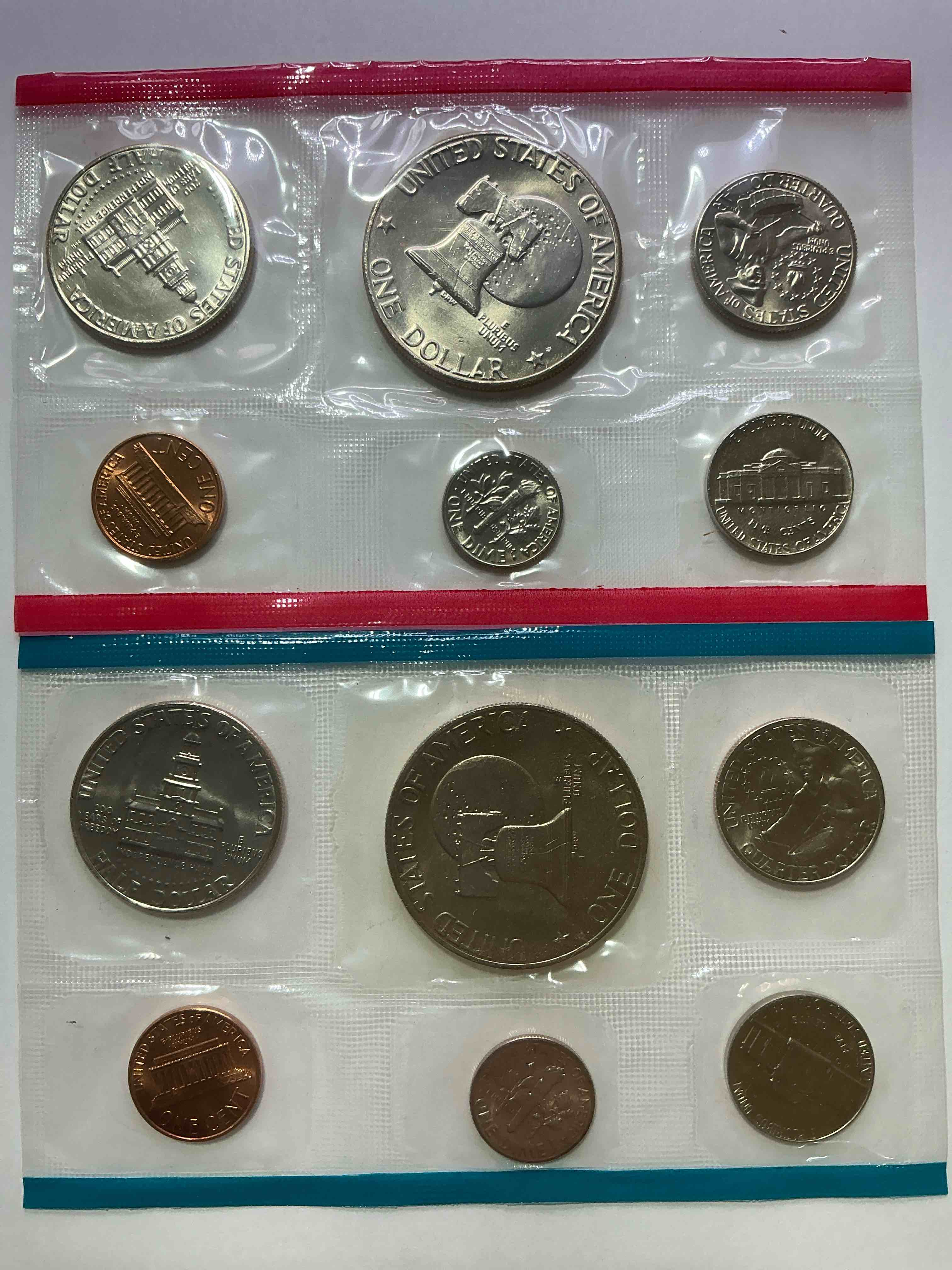 Condition photo showing New/Like New for 1976 bicentennial mint coins! these highly collectible mint coins includes 12 coins, 6 minted from each mint location (philly & denver) that year. coins are 1976 special bicentennial edition, to include rare bicentennial "ike" dollar!