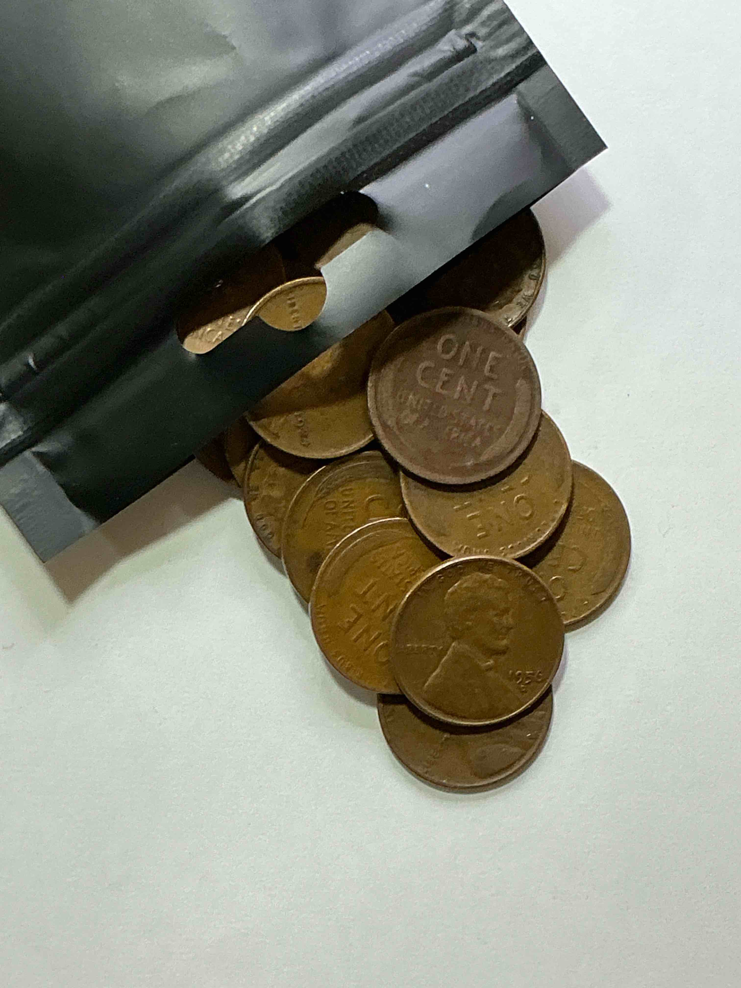 Condition photo showing Good Condition for antique wheat pennies 50 count un-searched lot! wheat pennies were minted from 1909-1958 originally replacing the indian head penny. there are many, many interesting & valuable years / mint marks in wheat pennies, win this lot & have fun searching to see what you get! a great way to start collecting antique coins!