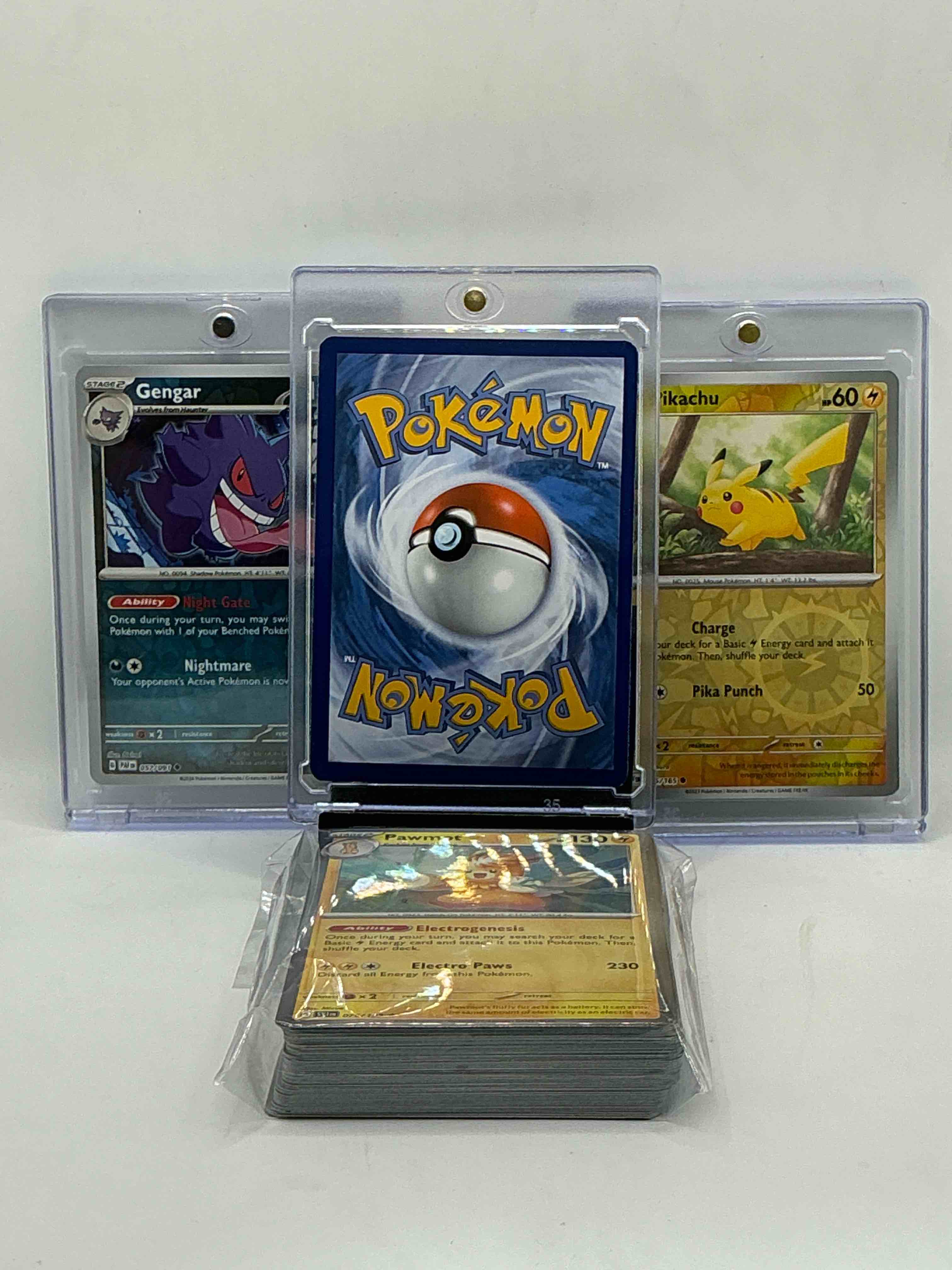 Condition photo showing New/Like New for pokémon party! charizard! gengar! pikachu! along with 50 other pokémon heroes, holos, legends & commons- including 1 stage two rare holographic, 2 stage one rare holographic, 3 basic rare holographic, 4 common/ uncommon holographics (all stages), 2 stage two non holographic & 2 rares! also includes 36 non holo common/ uncommon basic & first stage cards trainers & energy too! perfect set for collectors & enthusiasts!