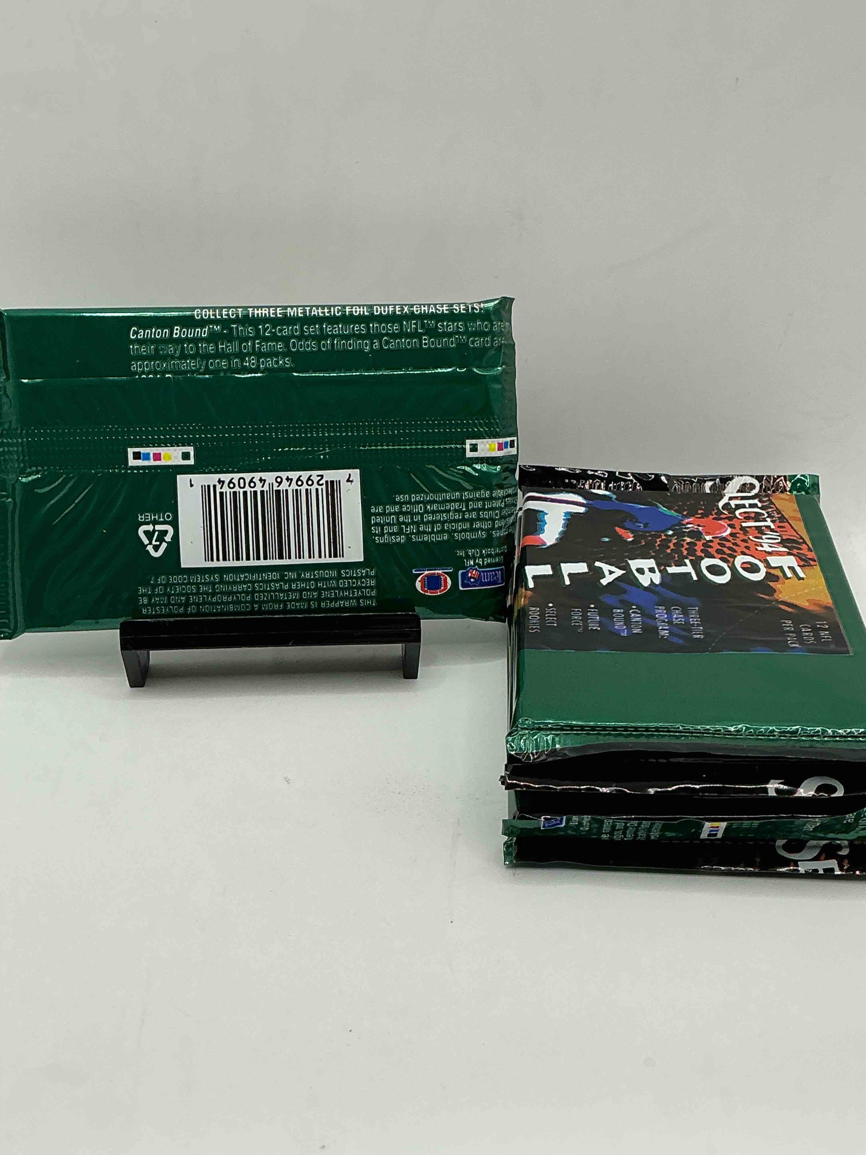 Condition photo showing New/Like New for select ‘94 nfl football packs! search for the 3 tier chase program including “canton bound” “future force” & “select rookies” cards! 1990’s football fans rejoice!