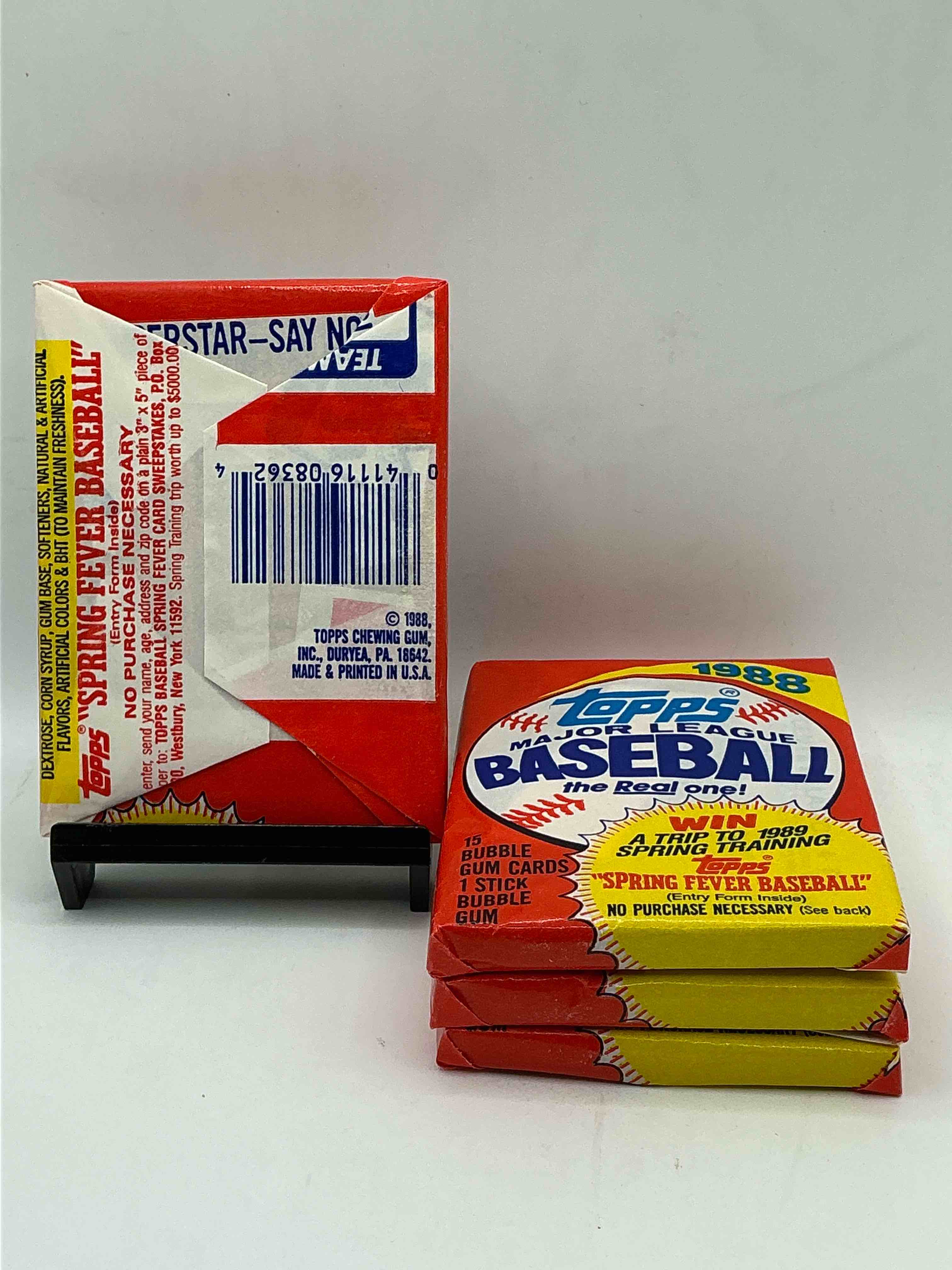 Condition photo showing New/Like New for 80's baseball fan's rejoice! 1988 topps baseball unopened wax packs full of collectible trading cards! search for valuable don mattingly "world of baseball" & nolan ryan cards worth hundreds in perfect condition!