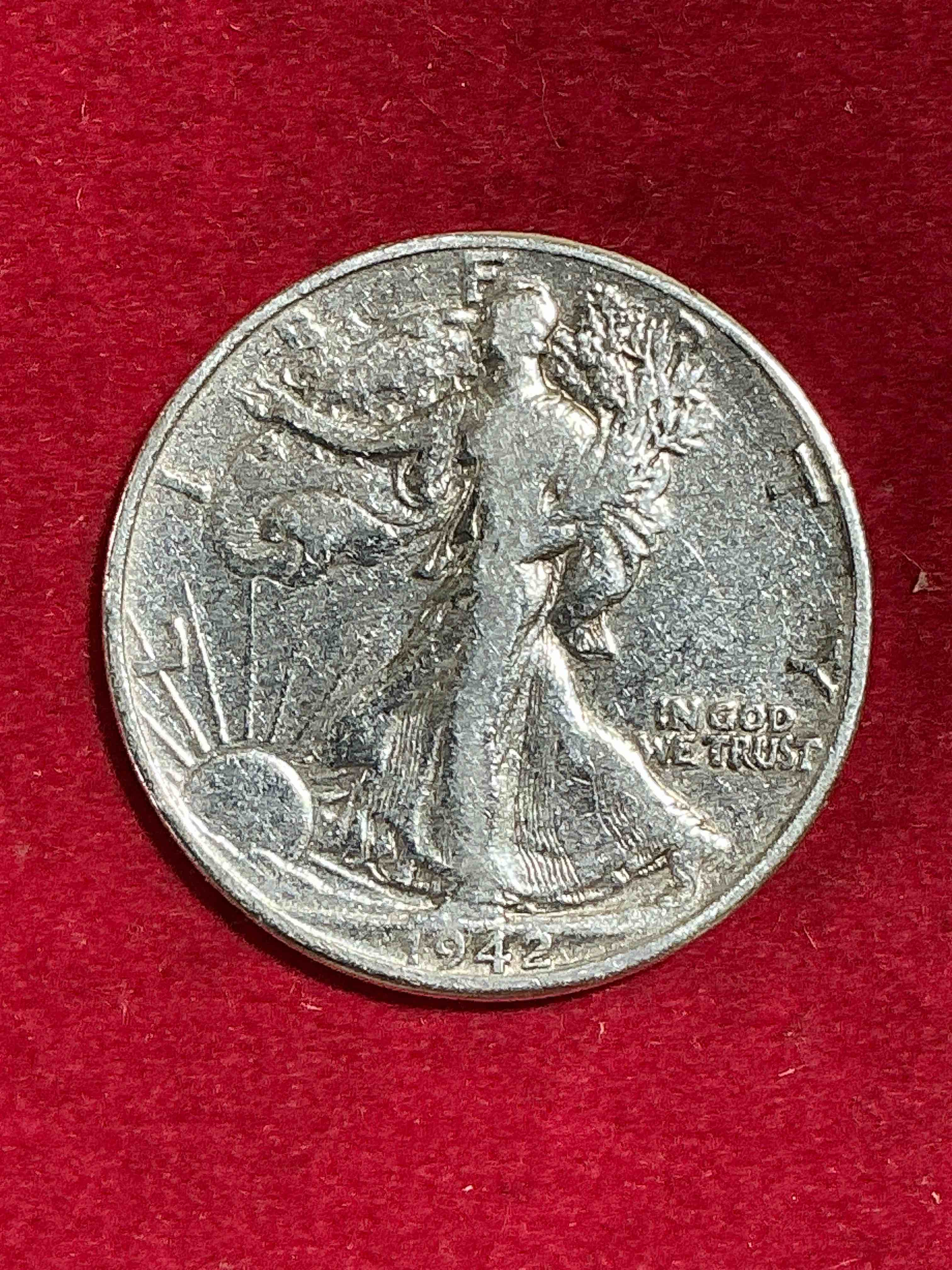world war ii era silver! antique u.s. silver! liberty walking silver fine u.s. silver half dollar! this striking half dollars were minted from 1916-1947 & have become some of the most collectible coins in history! here is a striking appears uncirculated example from 1942! liberty walking coins are 90% fine u.s. silver, a great investment in precious metal!