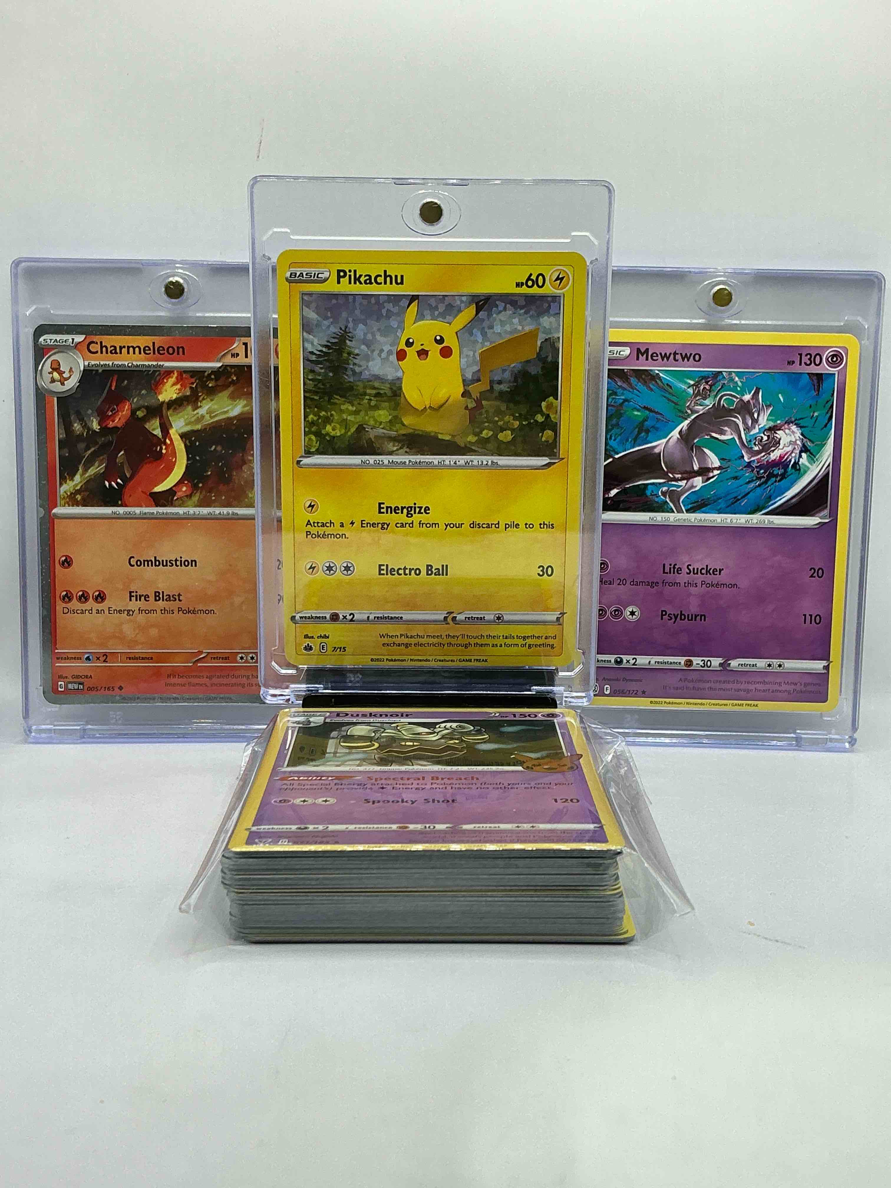 Condition photo showing New/Like New for pikachu! mewtwo! charmeleon! big three monsters! along with 50 other pokémon heroes, holos, legends & commons- including 1 stage two rare holographic, 2 stage one rare holographic, 3 basic rare holographic, 4 common/ uncommon holographics (all stages), 2 stage two non holographic & 2 rares! also includes 36 non holo common/ uncommon basic & first stage cards trainers & energy too! perfect set for collectors & enthusiasts!