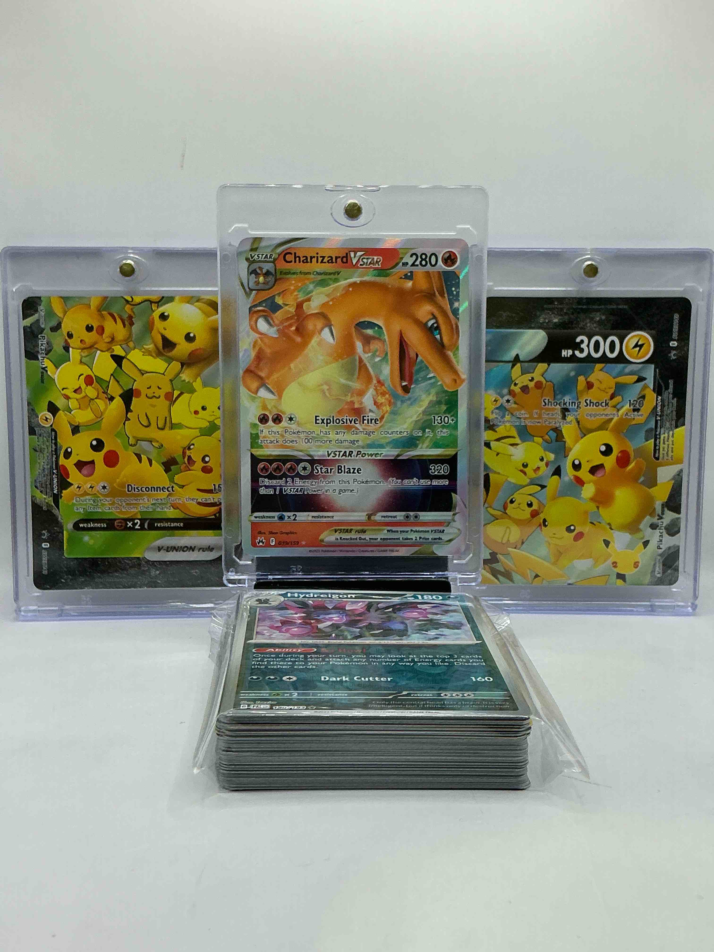 Charizard VSTAR & Matching Pikachu V WOW! Insane! Along With 50 Other Pokémon Heroes, Holos, Legends & Commons- Including 1 Stage Two Rare Holographic, 2 Stage One Rare Holographic, 3 Basic Rare Holographic, 4 Common/ Uncommon Holographics (All Stages), 2 Stage Two Non Holographic & 2 Rares! Also Includes 36 Non Holo Common/ Uncommon Basic & First Stage Cards Trainers & Energy Too! Perfect Set For Collectors & Enthusiasts!
