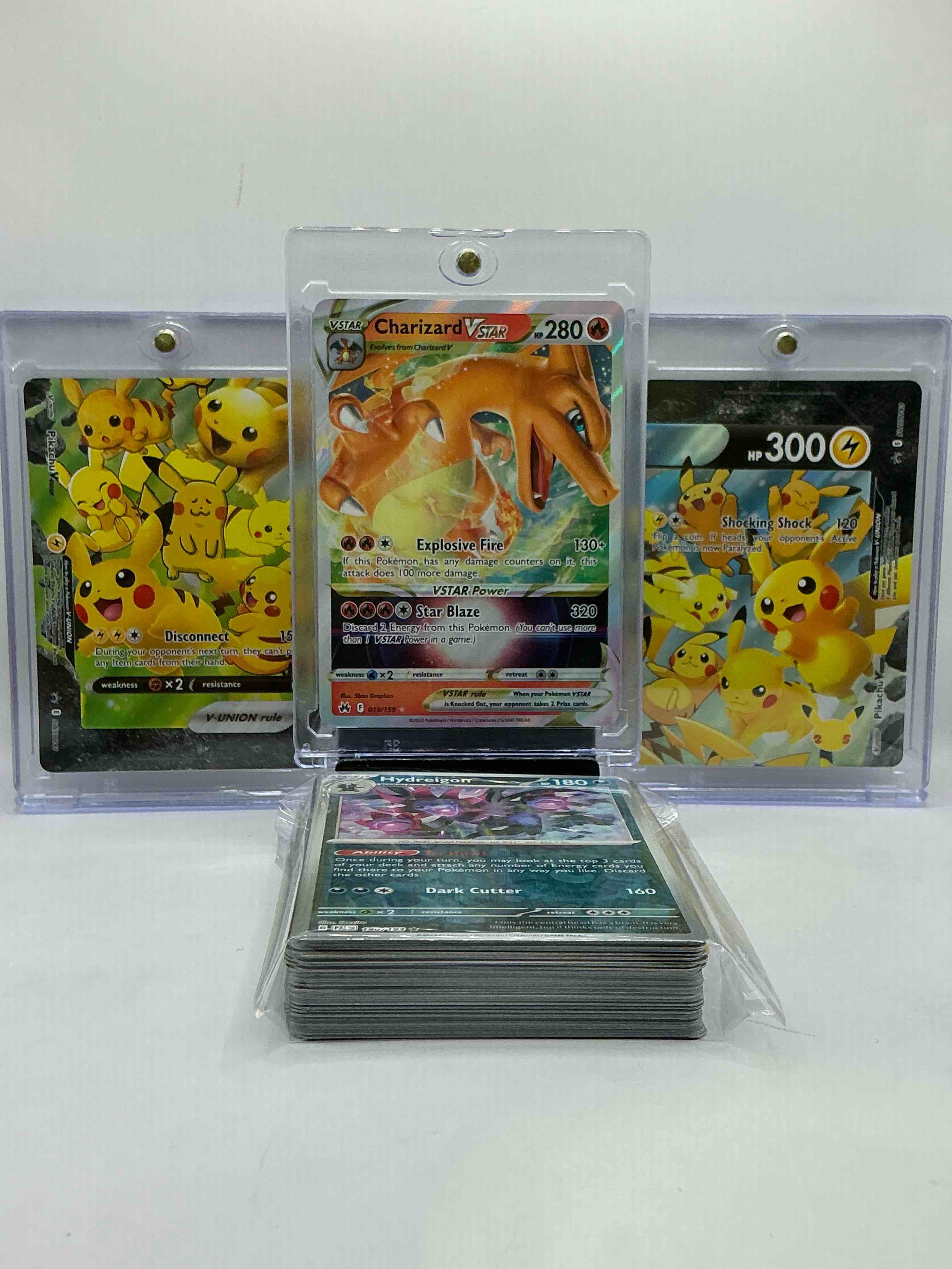 Condition photo showing New/Like New for charizard vstar & matching pikachu v wow! insane! along with 50 other pokémon heroes, holos, legends & commons- including 1 stage two rare holographic, 2 stage one rare holographic, 3 basic rare holographic, 4 common/ uncommon holographics (all stages), 2 stage two non holographic & 2 rares! also includes 36 non holo common/ uncommon basic & first stage cards trainers & energy too! perfect set for collectors & enthusiasts!