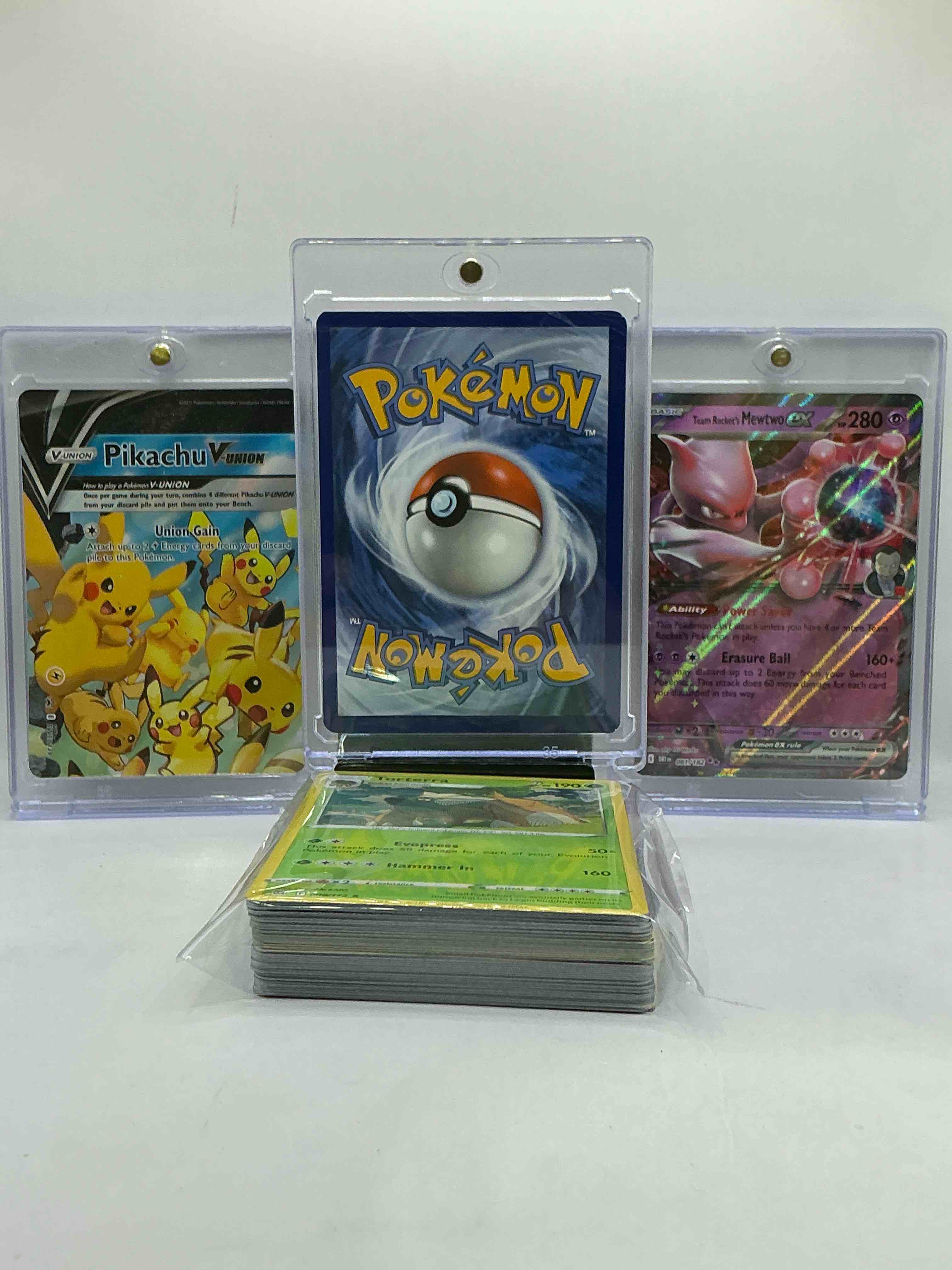 Condition photo showing New/Like New for mega charizard ex, pikachu vunion & rockets mewtwo! along with 50 other pokémon heroes, holos, legends & commons- including 1 stage two rare holographic, 2 stage one rare holographic, 3 basic rare holographic, 4 common/ uncommon holographics (all stages), 2 stage two non holographic & 2 rares! also includes 36 non holo common/ uncommon basic & first stage cards trainers & energy too! perfect set for collectors & enthusiasts!