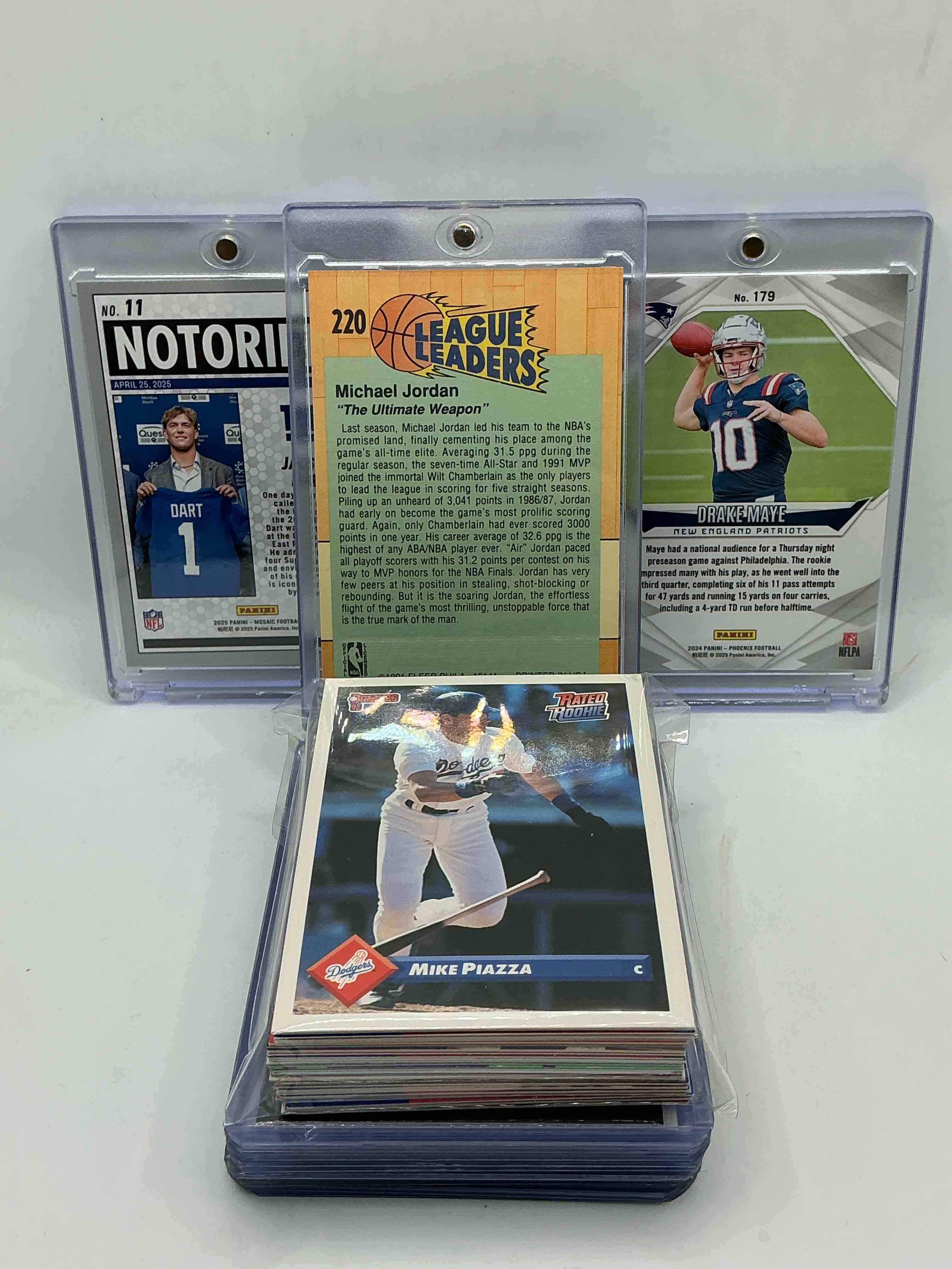 Condition photo showing New/Like New for cool card craziness! 1991 fleer nba league leaders michael jordan! 2025 mosaic football notoriety rookie jaxson dart! 2024 phoenix football rookie drake maye! along with 45 other cool cards from all different sports & all different eras! football, basketball, baseball, nascar & so much more! rookies, legends & heroes from all eras!
