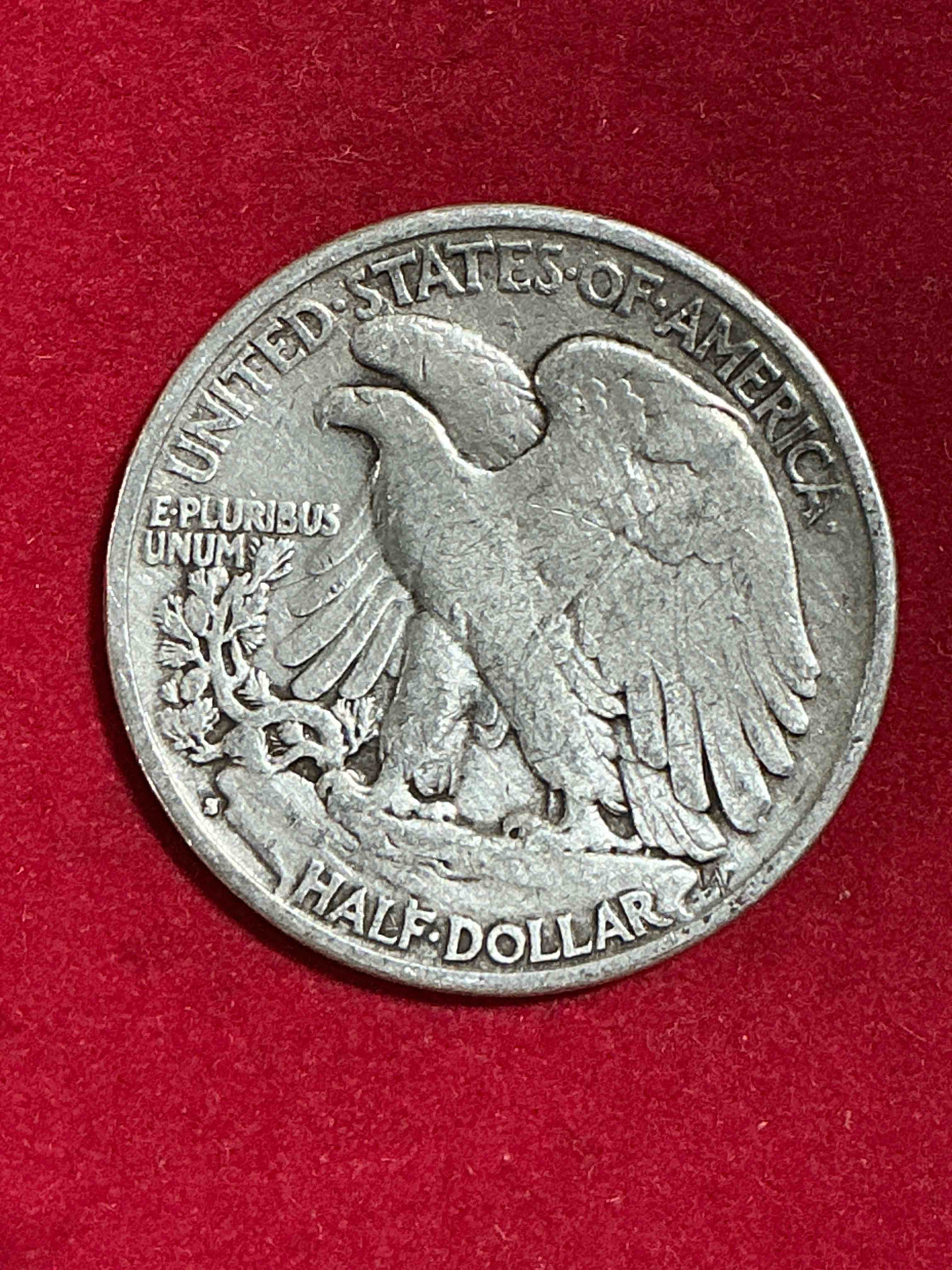 Condition photo showing Good Condition for antique u.s. silver! liberty walking silver fine u.s. silver half dollar! this striking half dollars were minted from 1916-1947 & have become some of the most collectible coins in history! here is a striking appears uncirculated example from 1940! liberty walking coins are 90% fine u.s. silver, a great investment in precious metal!