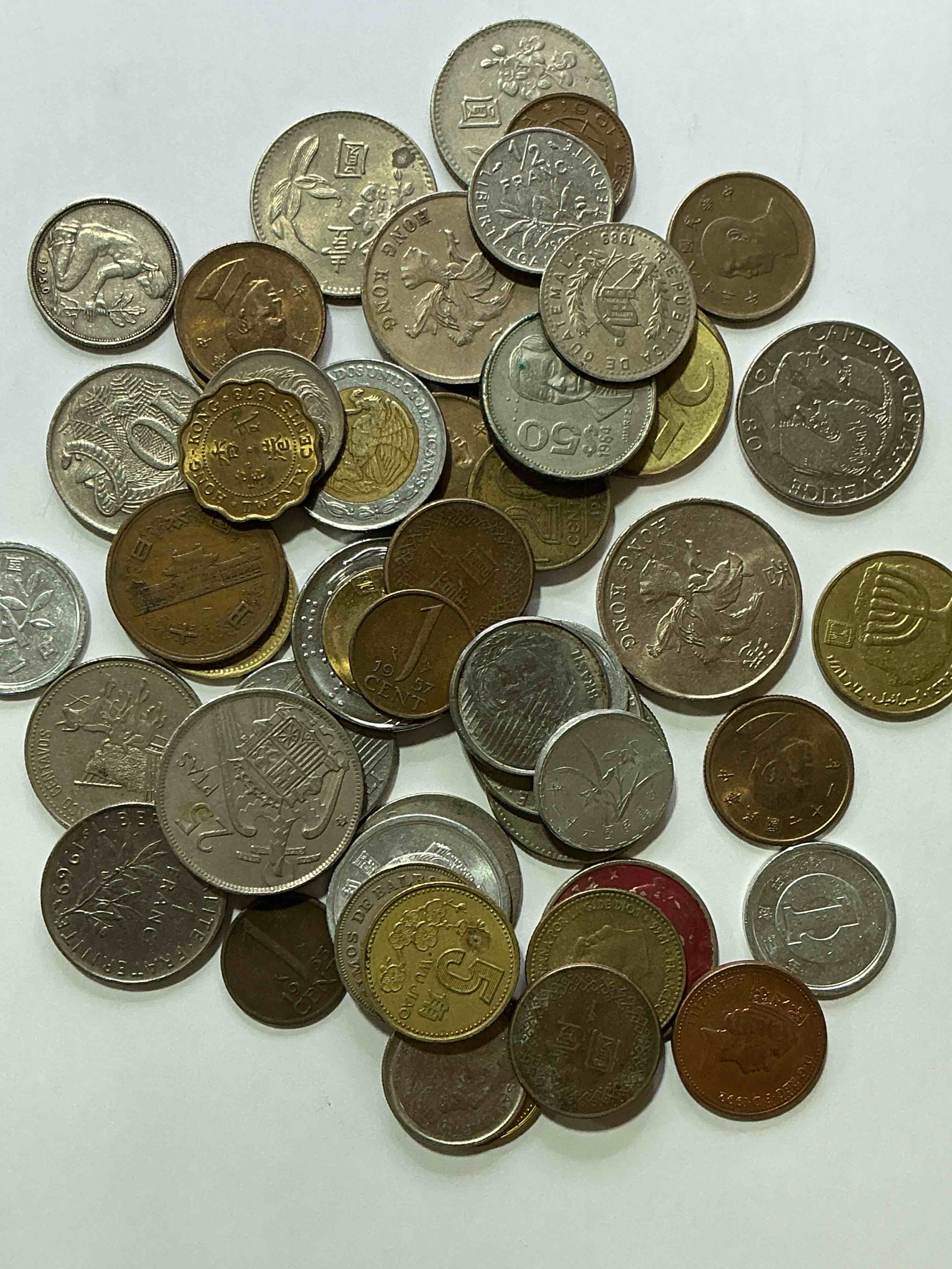 Condition photo showing Good Condition for world coins, antique & vintage! each lot is unique! many different years, countries, sizes & exotic places. this cool collection of antique coins from around the world is loads of fun! have fun identifying each coin & country as a great educational tool! a great investment too!