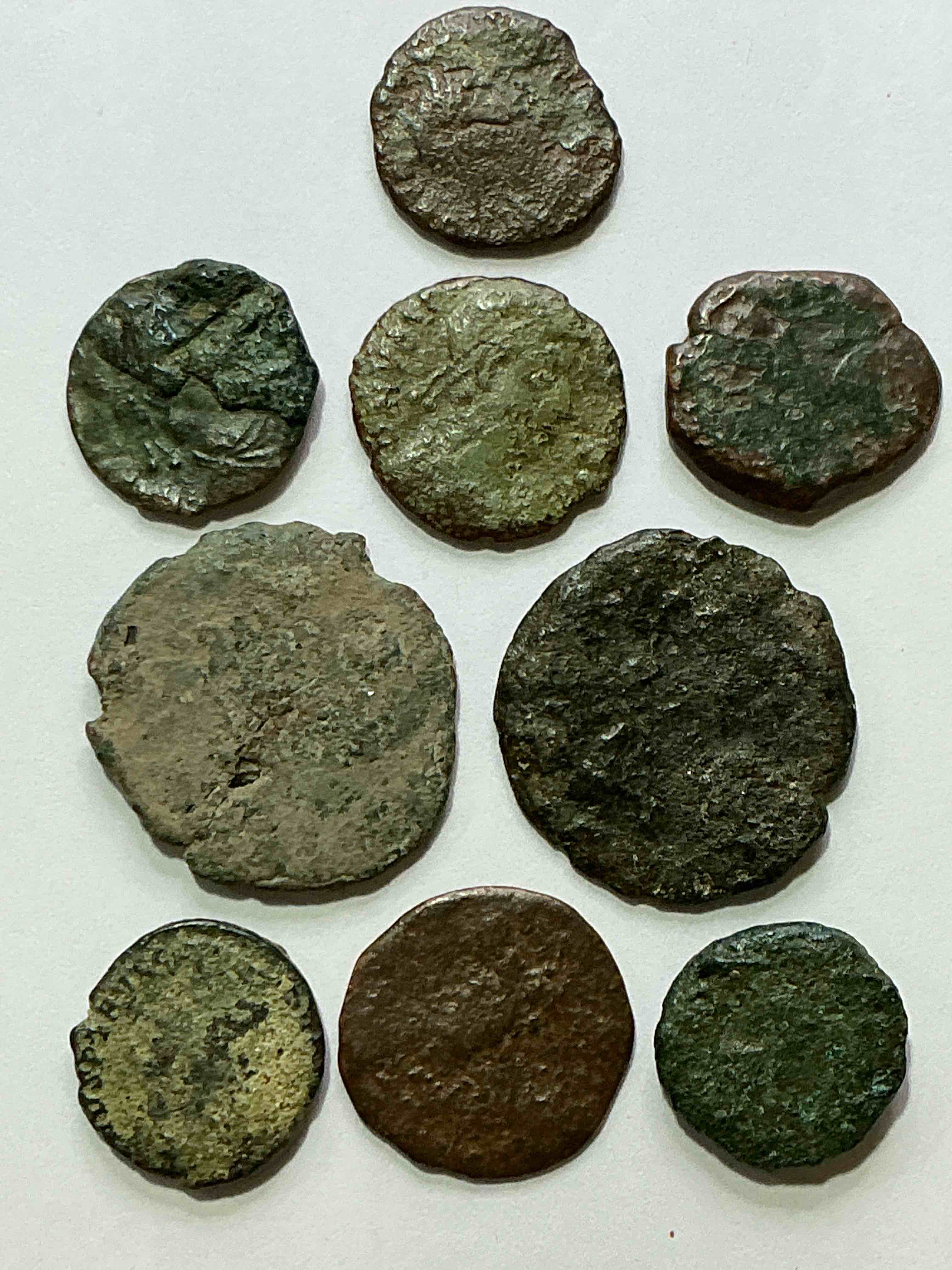 ancient roman coins! 1,600-1,700 years old approximately! check out these amazing authentic pieces of history, ancient roman bronze coins from the approx 300 to 400 a.d era... serious pieces of history & serious collector items! own authentic pieces of ancient history!