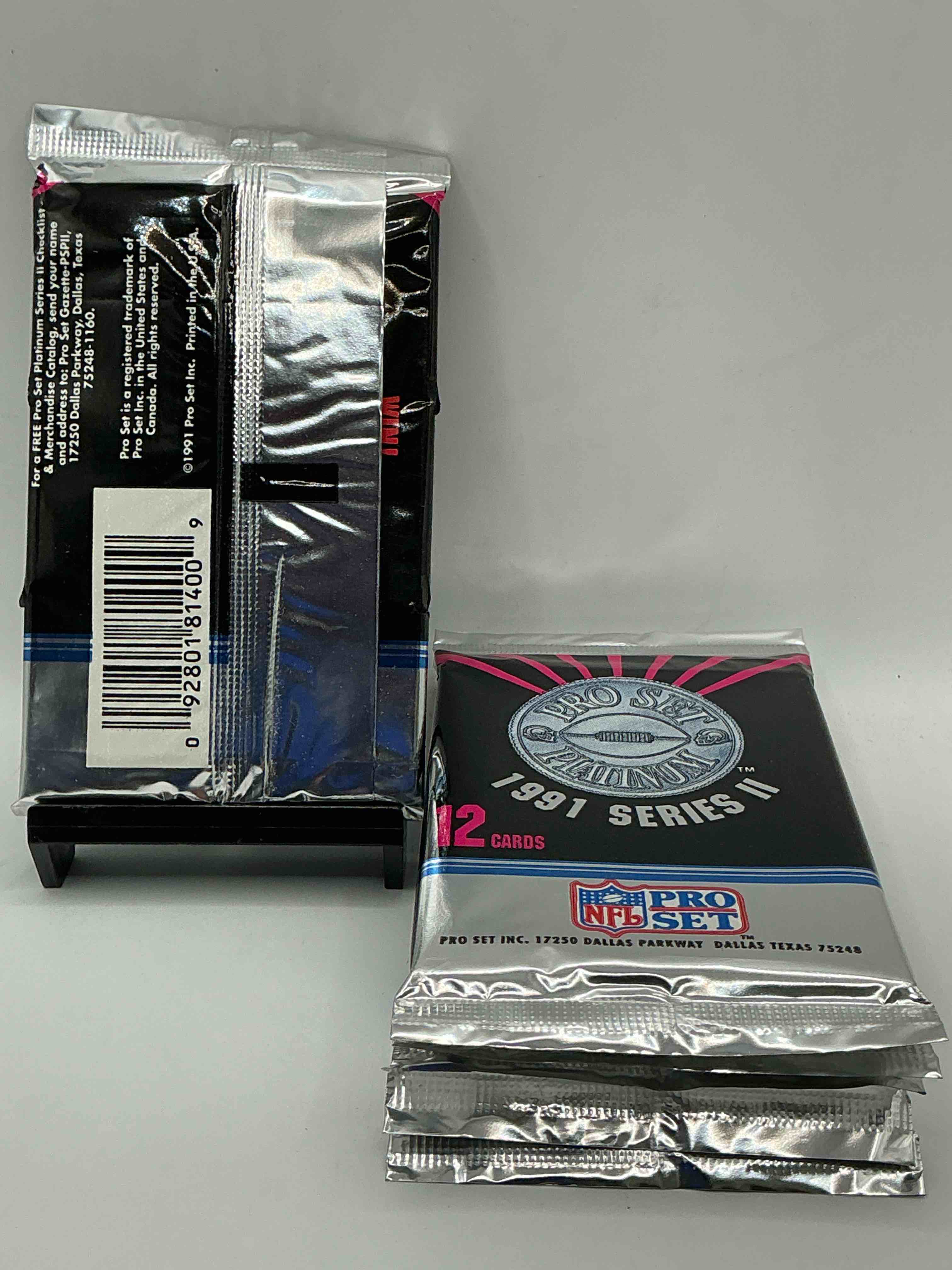 Condition photo showing New/Like New for 1991 pro set platinum edition series ii unopened packs! search for brett favre rookie & bill belichick coach rookie card as well as santa claus card!