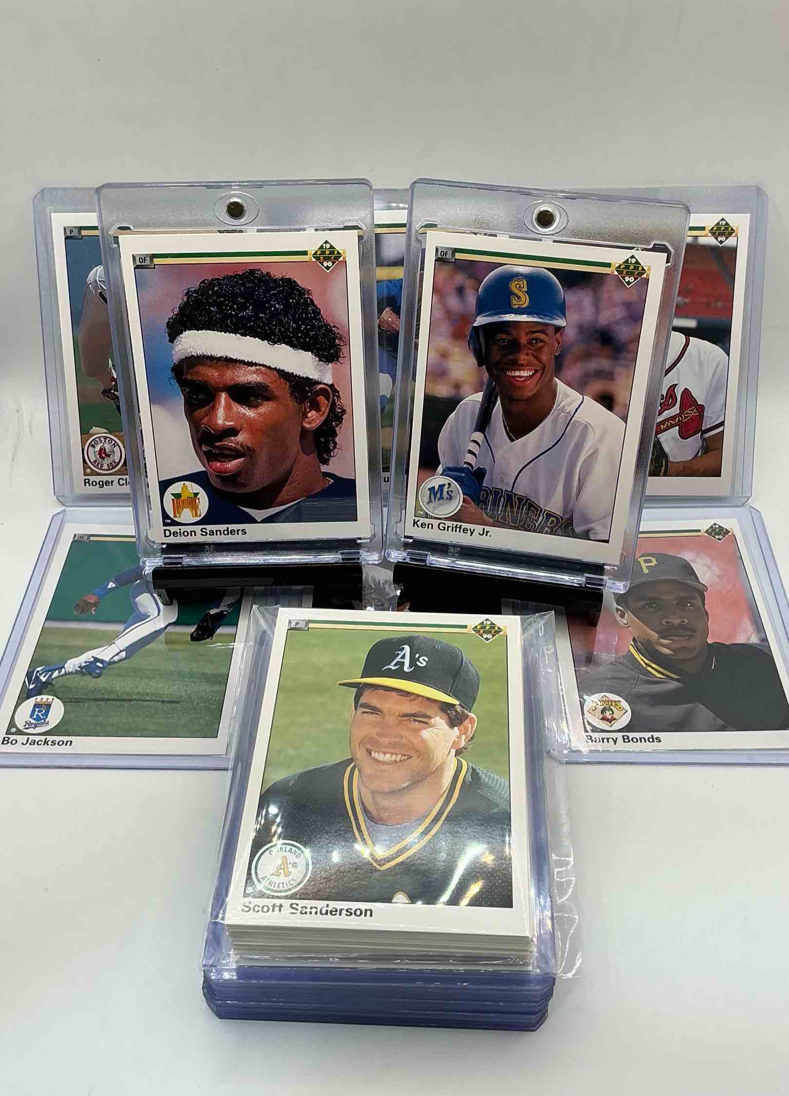 Product photo of 1990 upper deck 50 card baseball set! all the best players from 1990 in mlb! ken griffey jr, deion sanders, john smoltz, roger clemons, jose canseco, barry bonds & so many more! wow!