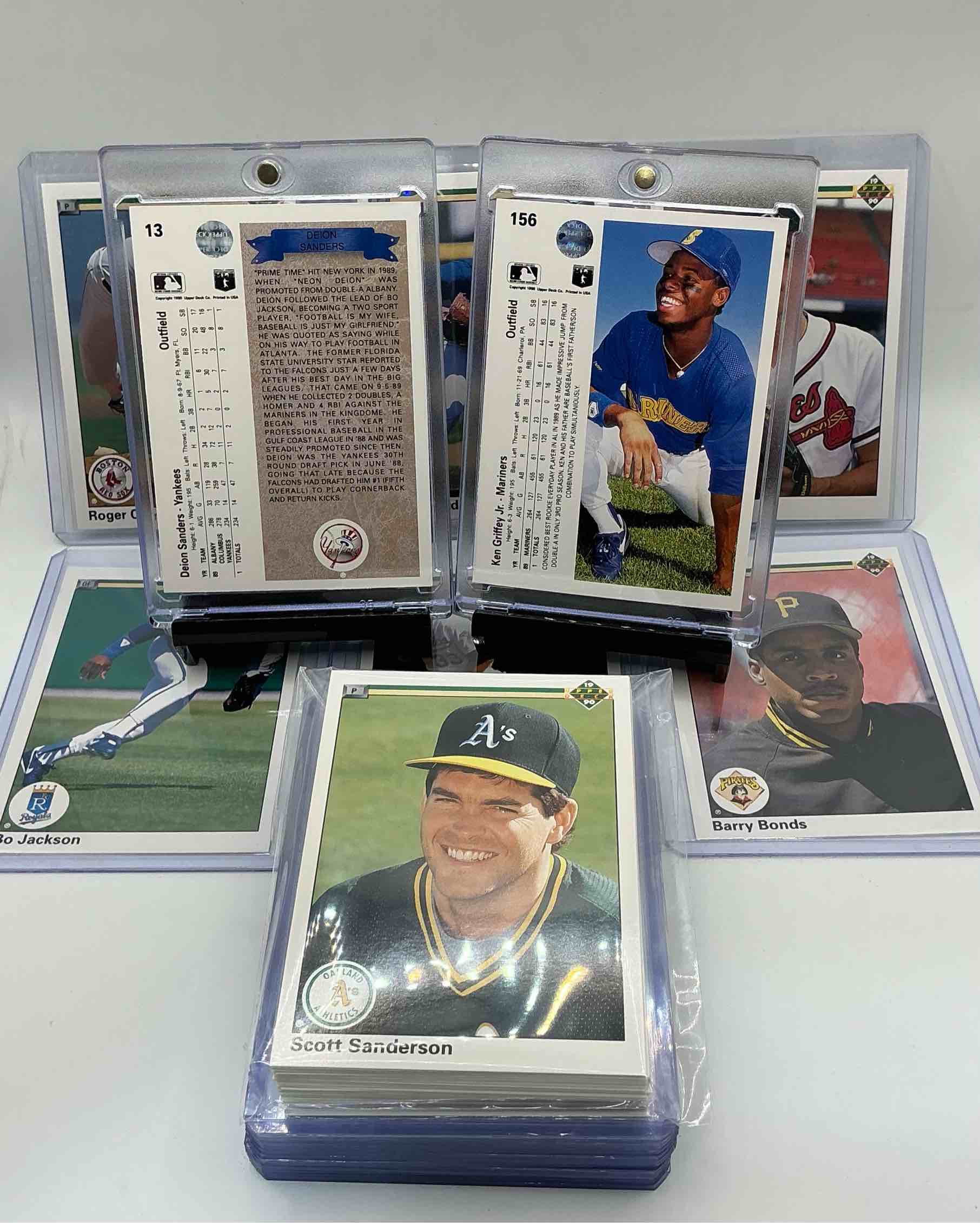 Condition photo showing New/Like New for 1990 upper deck 50 card baseball set! all the best players from 1990 in mlb! ken griffey jr, deion sanders, john smoltz, roger clemons, jose canseco, barry bonds & so many more! wow!