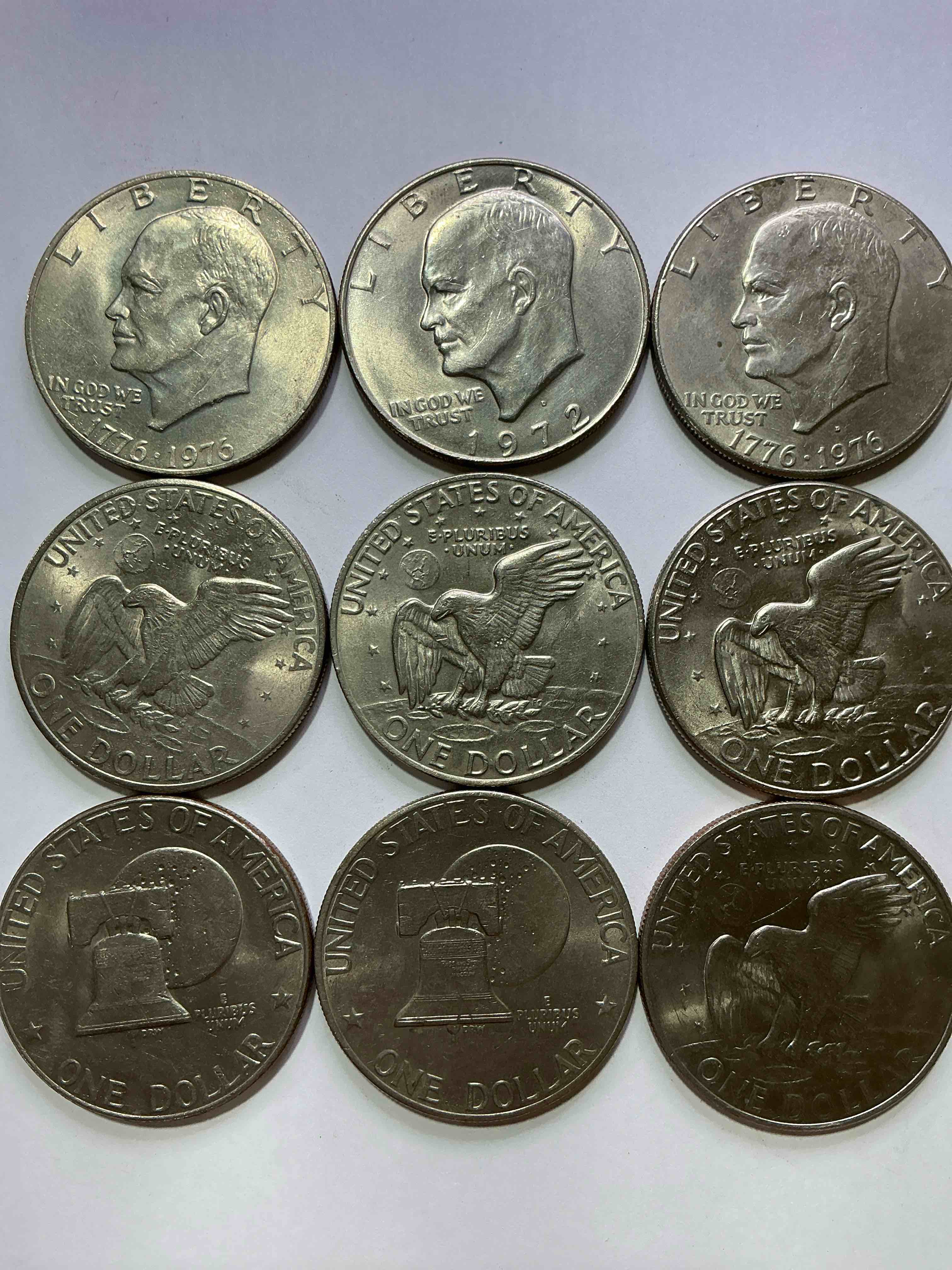 Condition photo showing Good Condition for gorgeous eisenhower dollar coins! these striking, large u.s. coins were minted from 1971-1978. here are gorgeous examples of “ike" dollars from 1976 & other years! these coins have become immensely popular with collectors & some have great toning!