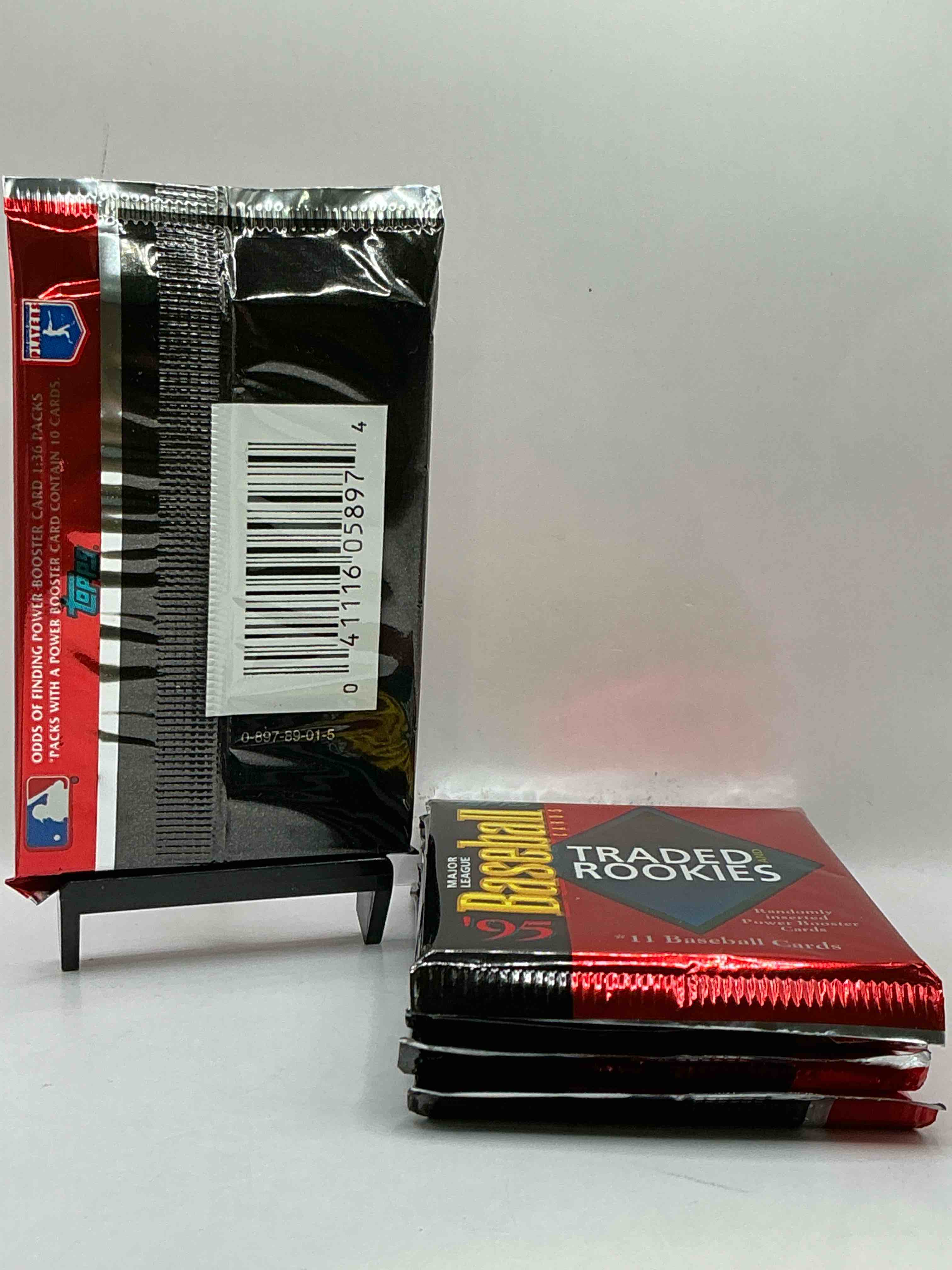 Condition photo showing New/Like New for baseball ultra rare! 1995 rookies & traded packs, potentially filled with some awesome cards! look for power boosters, rookies & more!