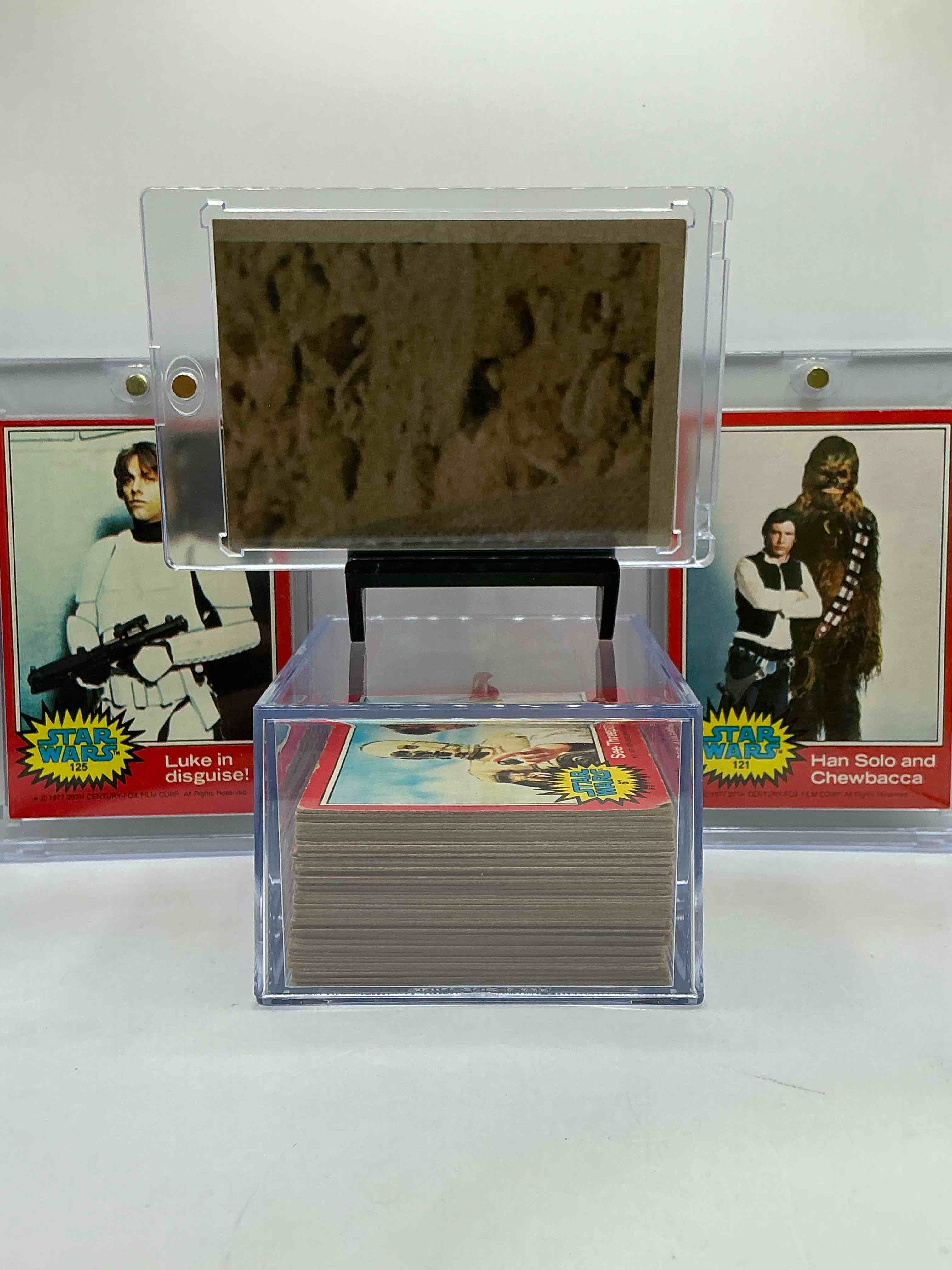 Condition photo showing New/Like New for 1977 star wars authentic original! complete 1977 star wars movie card set, series two red edition, all 66 cards included. cards in good to fine condition. an amazing way to get a very hard to find, genuine 1977 star wars series two complete card set!