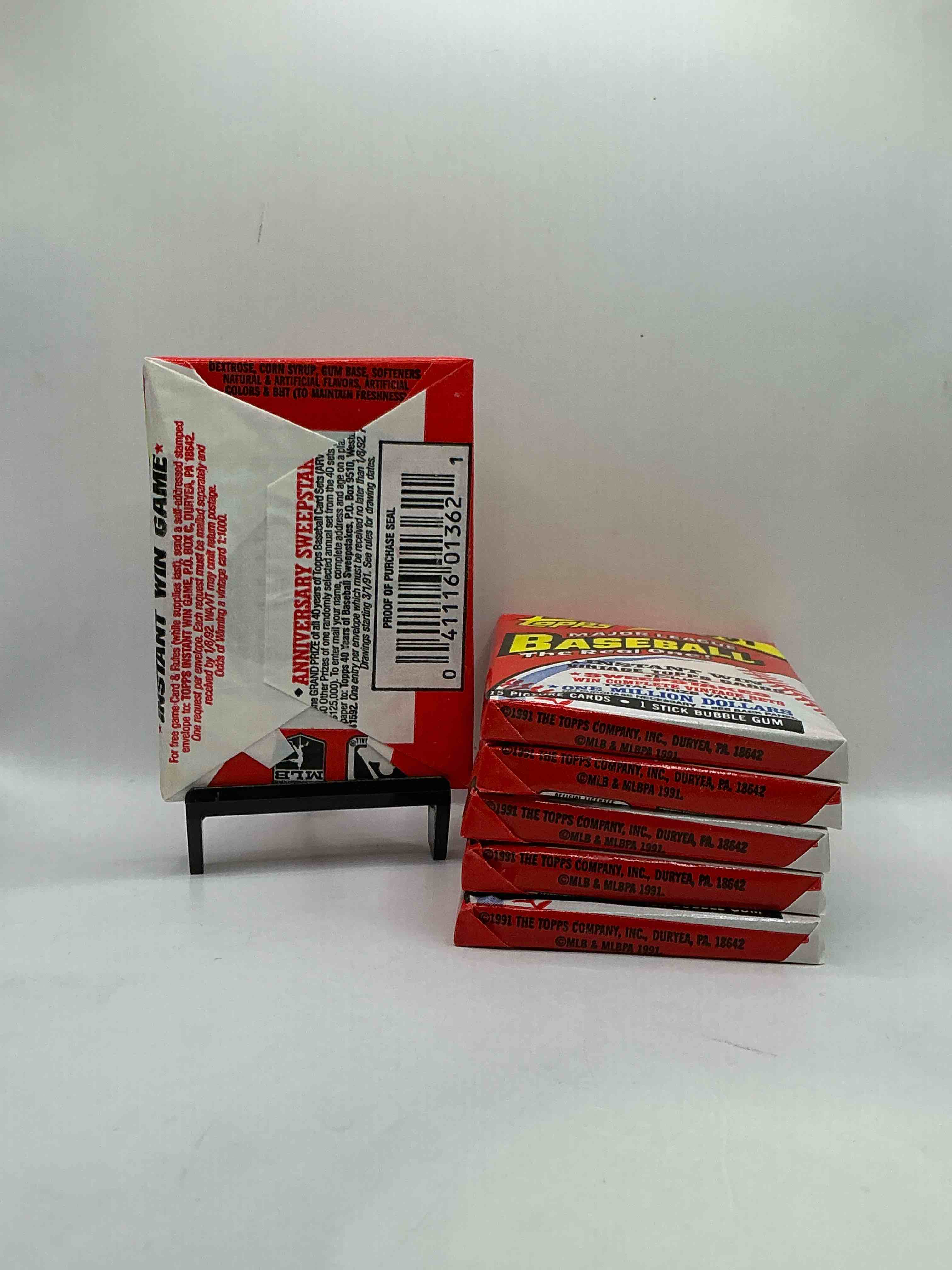 Condition photo showing New/Like New for 1991 topps baseball card unopened packs, straight from box! search for ken griffey jr cards, bo jackson cards & other 80s & 90s stars! perfect baseball packs!