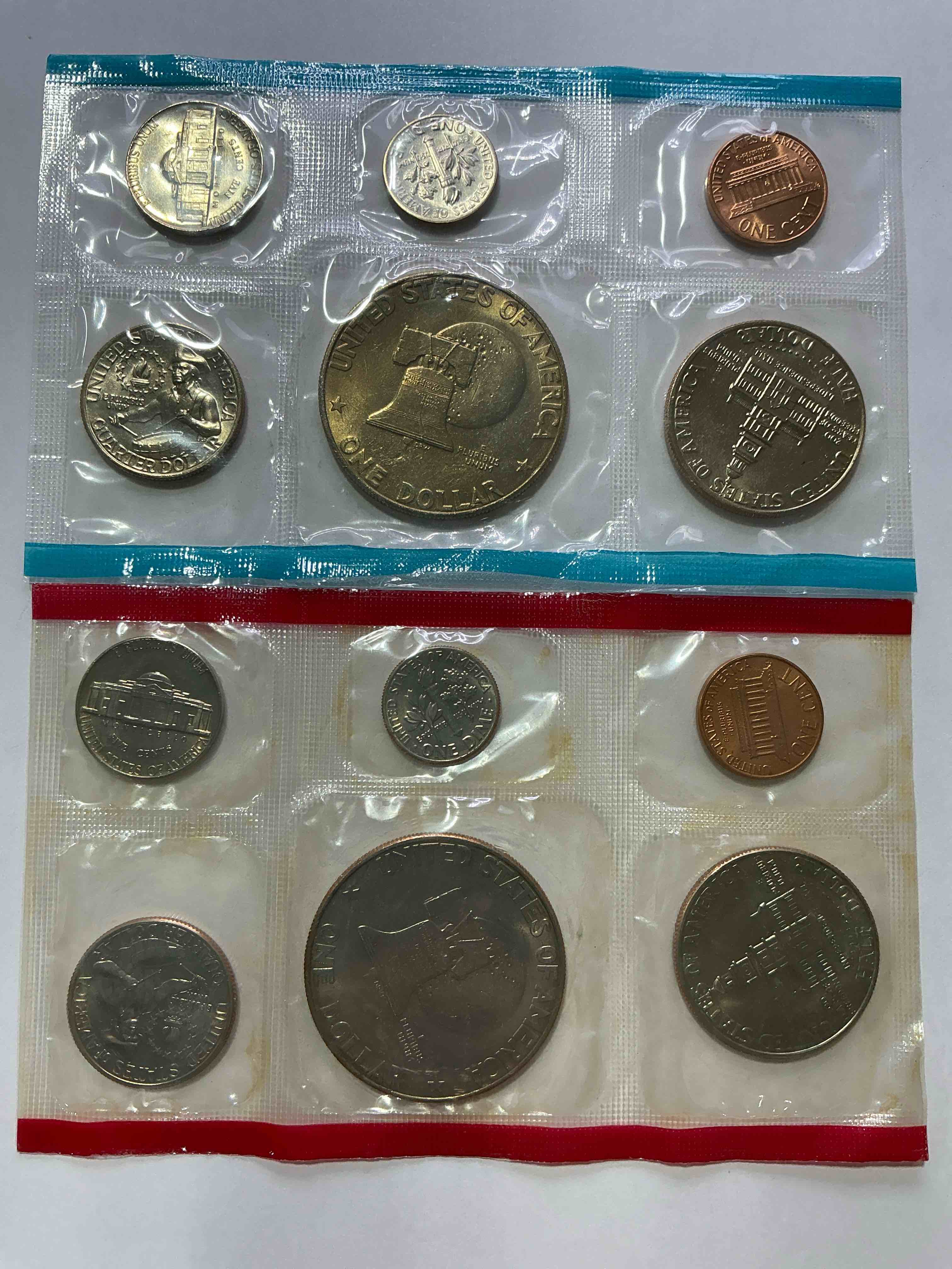 Condition photo showing New/Like New for 1976 bicentennial mint coins! these highly collectible mint coins includes 12 coins, 6 minted from each mint location (philly & denver) that year. coins are 1976 special bicentennial edition, to include rare bicentennial "ike" dollar!