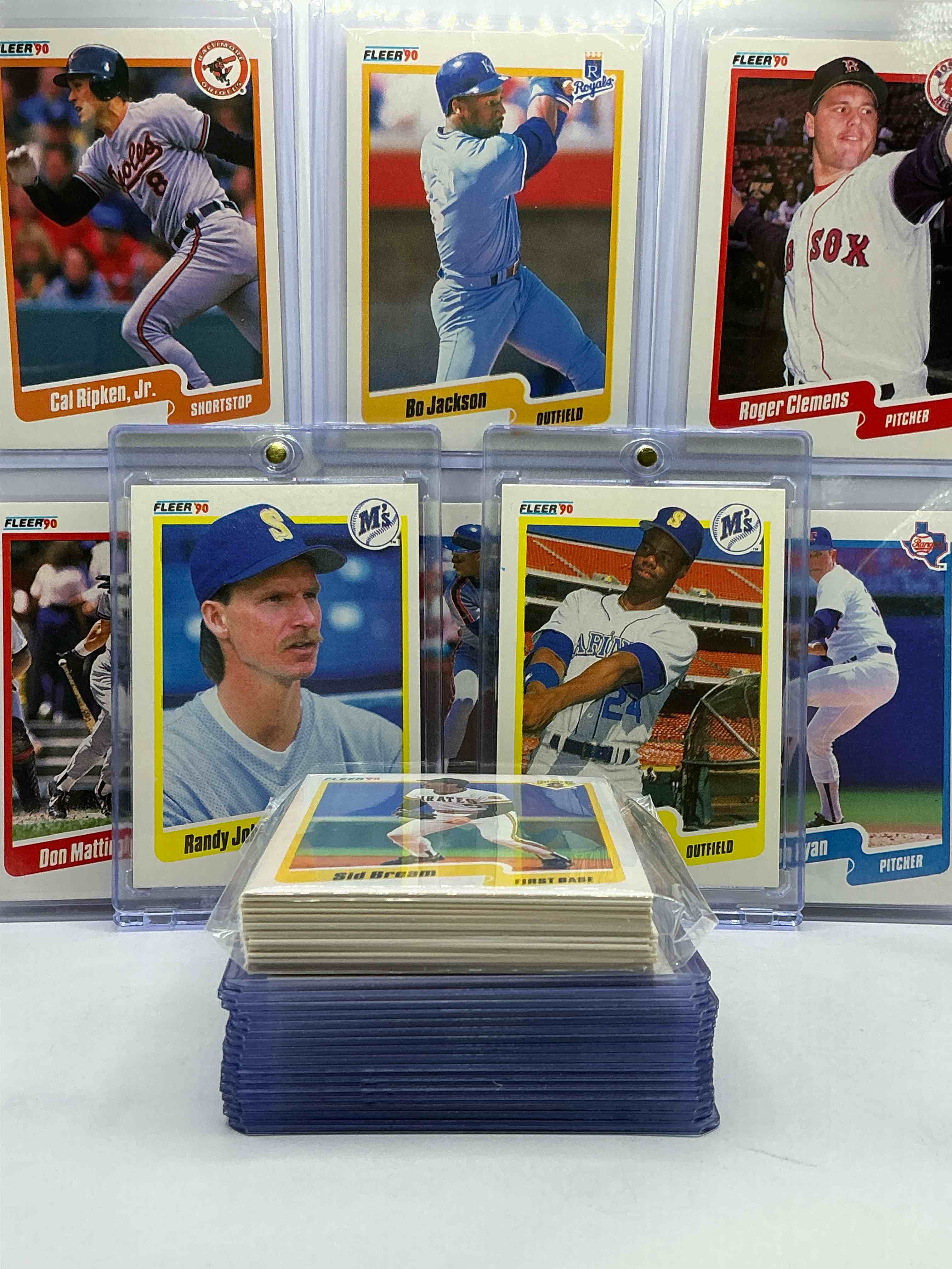 Condition photo showing New/Like New for ken griffey jr, nolan ryan & more! 1990 fleer baseball! 50 card set, wow! includes some of the craziest cards & players of all time! some names include mark mcgwire, jose canseco, don mattingly, darryl strawberry, dwight gooden, kirby puckett, deion sanders, barry bonds, george brett, cal ripken & more! baseball legends!