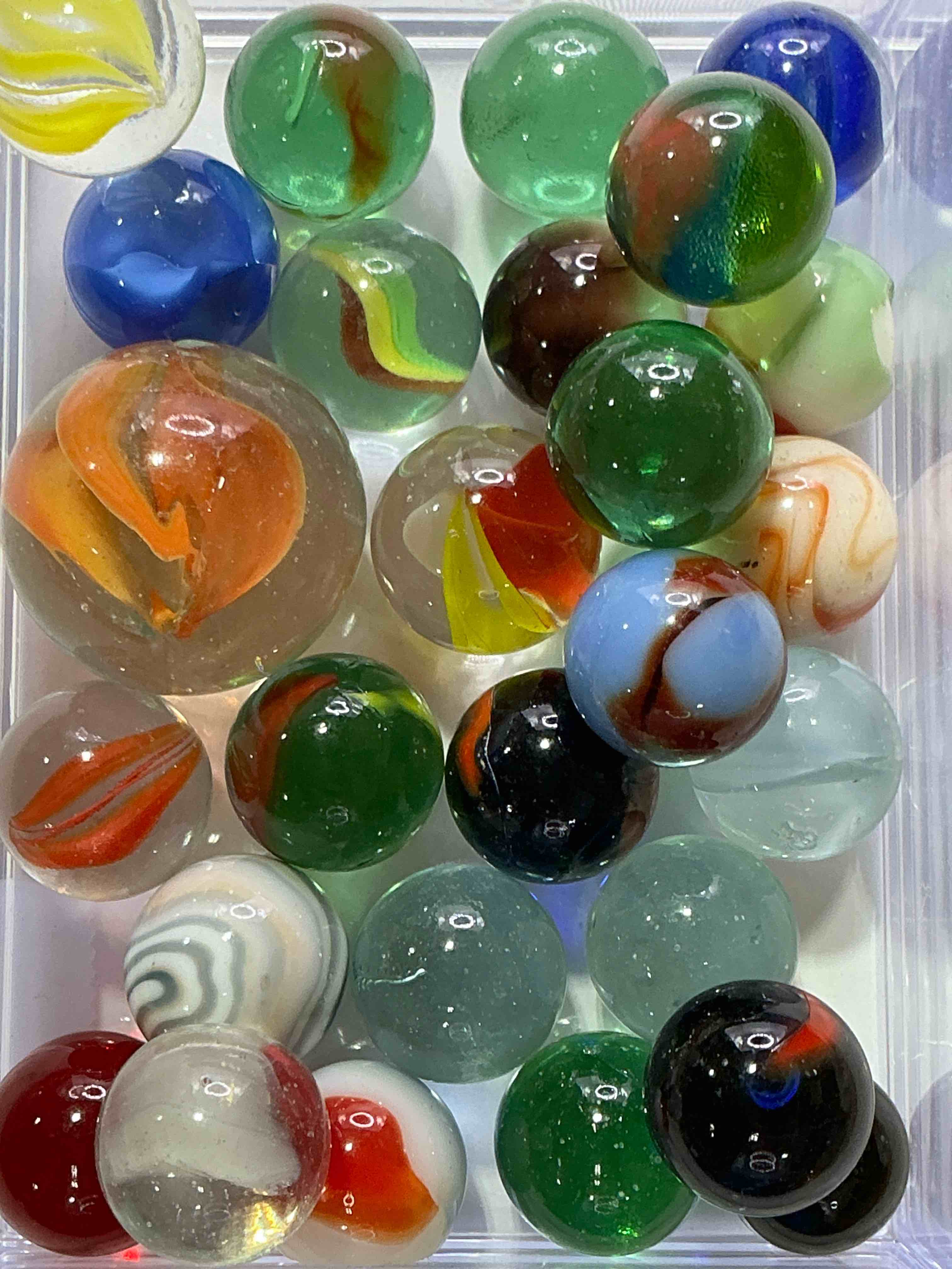 Condition photo showing New/Like New for antique glass marbles! genuine stunning marbles lot, all marbles made between the years 1925-1965 & made with uranium! many are great depression era & even earlier! gorgeous, authentic pieces of history!