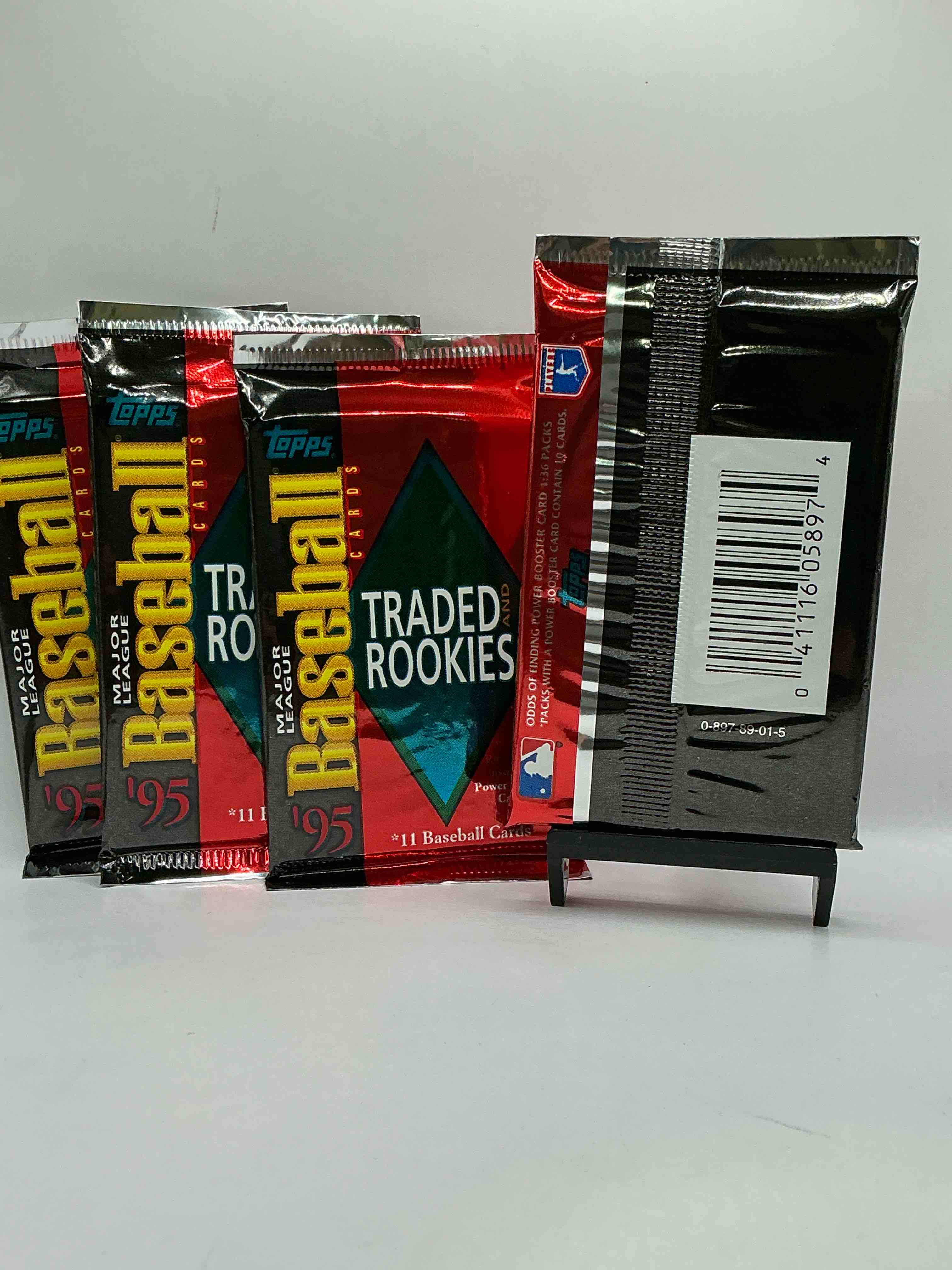 Condition photo showing New/Like New for baseball ultra rare! 1995 rookies & traded packs, potentially filled with some awesome cards! look for power boosters, rookies & more!