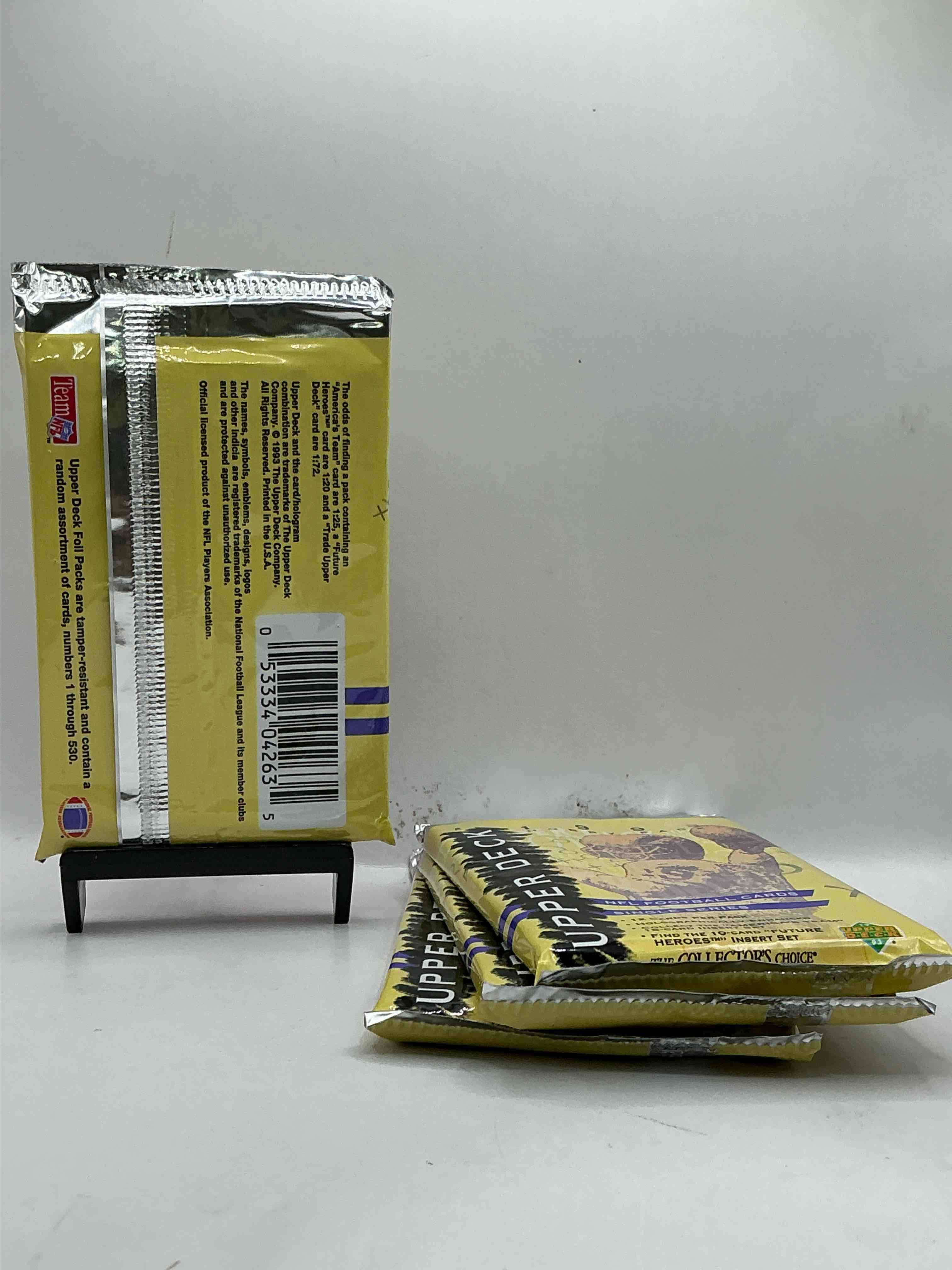 Condition photo showing New/Like New for 1993 upper deck football packs! single series! search for "americas team" 15 card insert set, 10 card "future heroes" insert set & more! legends & stars!