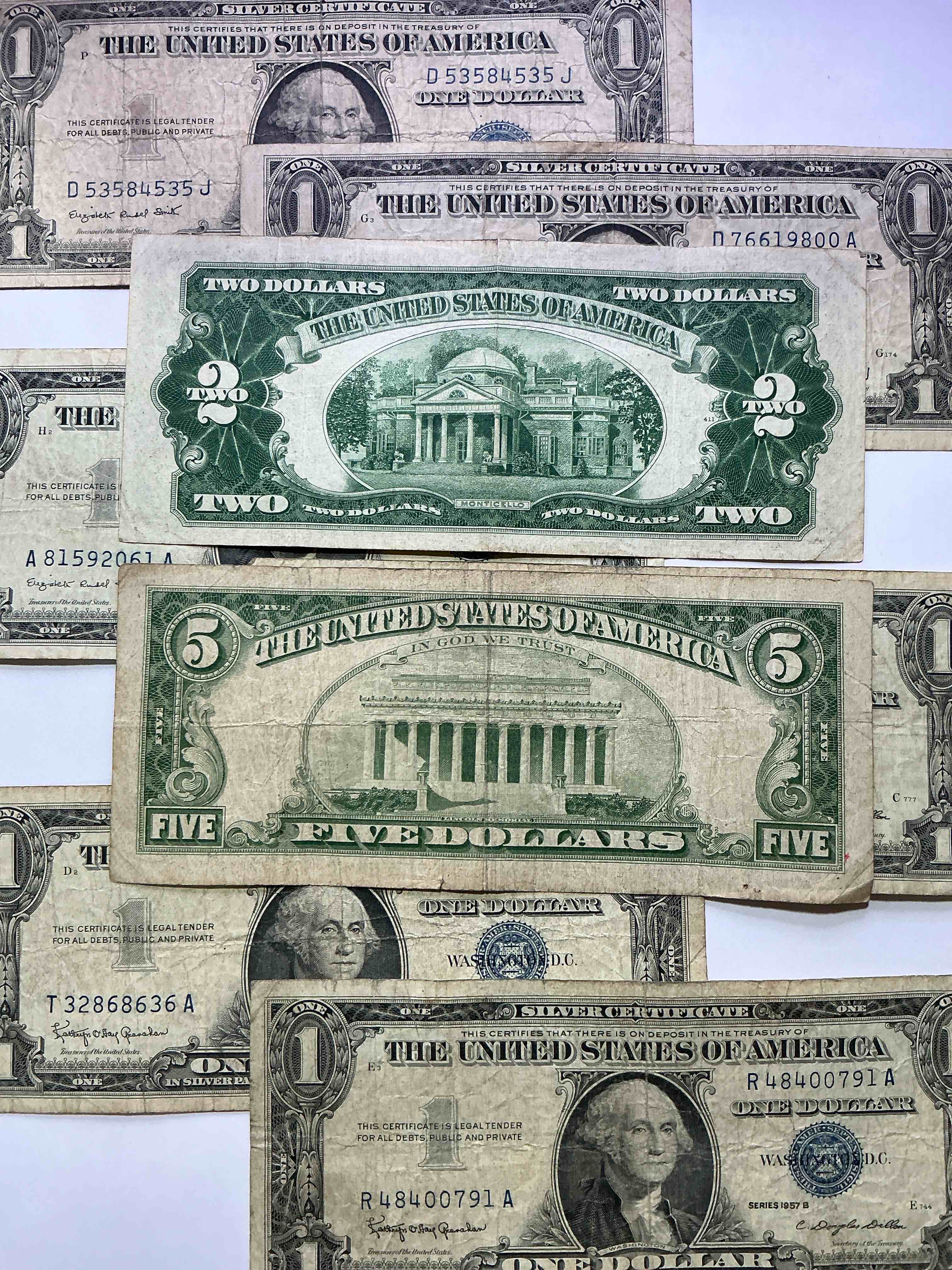 Condition photo showing New/Like New for rare american dollar bills! red seal five dollar bill & red seal two dollar bill, along with silver certificates! five dollar bill ultra rare & in good condition, red seal two dollar bill in good condition & silver certificates produced from 1878 to 1964 & are still considered legal tender at face value. here are gorgeous, circulated 1935 & 1957 u.s. one dollar silver certificate, with highly collectible "blue seal!* own an awesome piece of history! american dollar lot! 