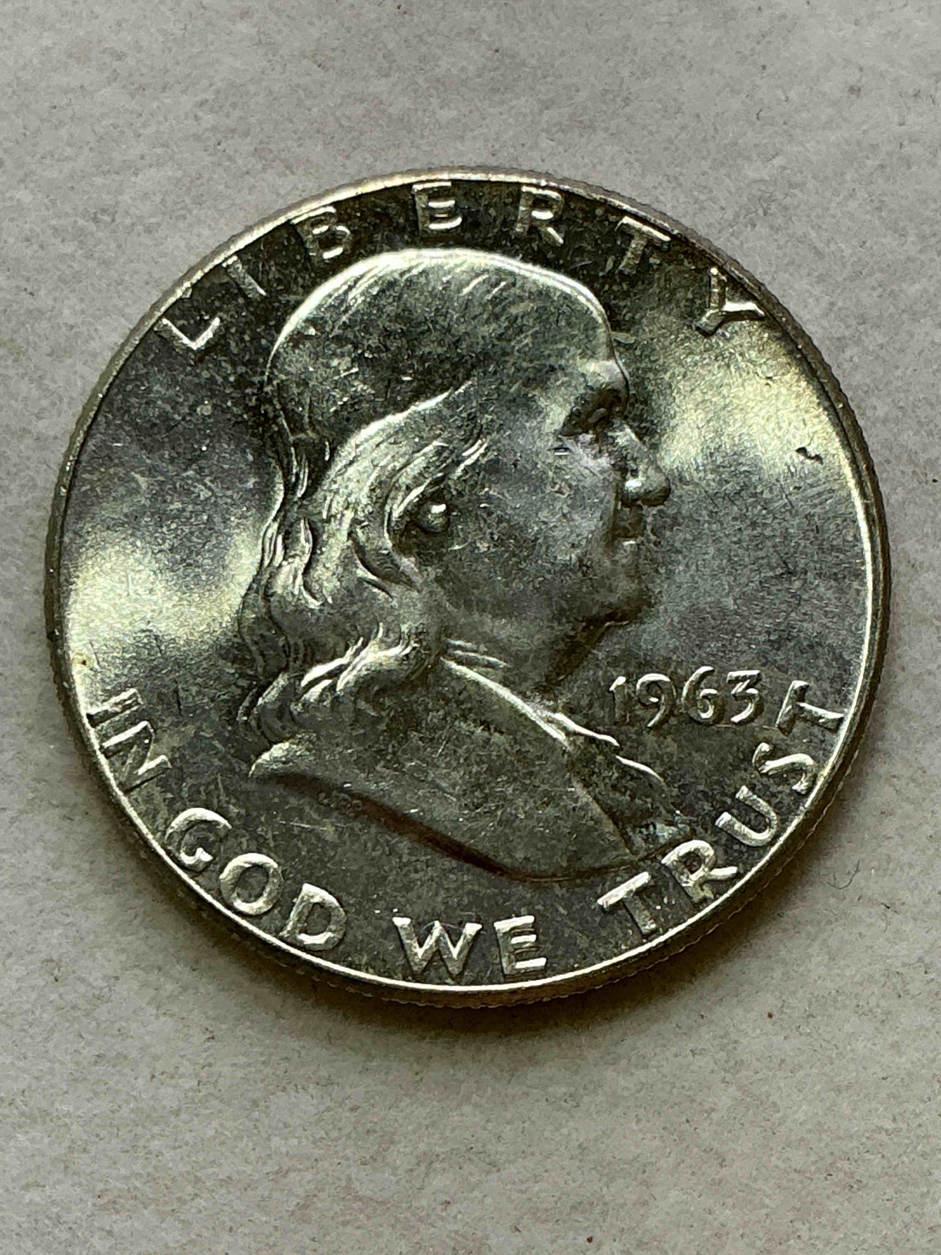 ben franklin uncirculated silver! pre 1965 silver u.s. half dollar coin! before 1965 american half dollars were actually silver, here is a rare 1960 version in good condition! great for investing in precious metals! these heavy half dollars were minted at 90% silver and 10% copper, giving them a net weight of .36169 ounces of pure silver per coin! very rare in this great condition!