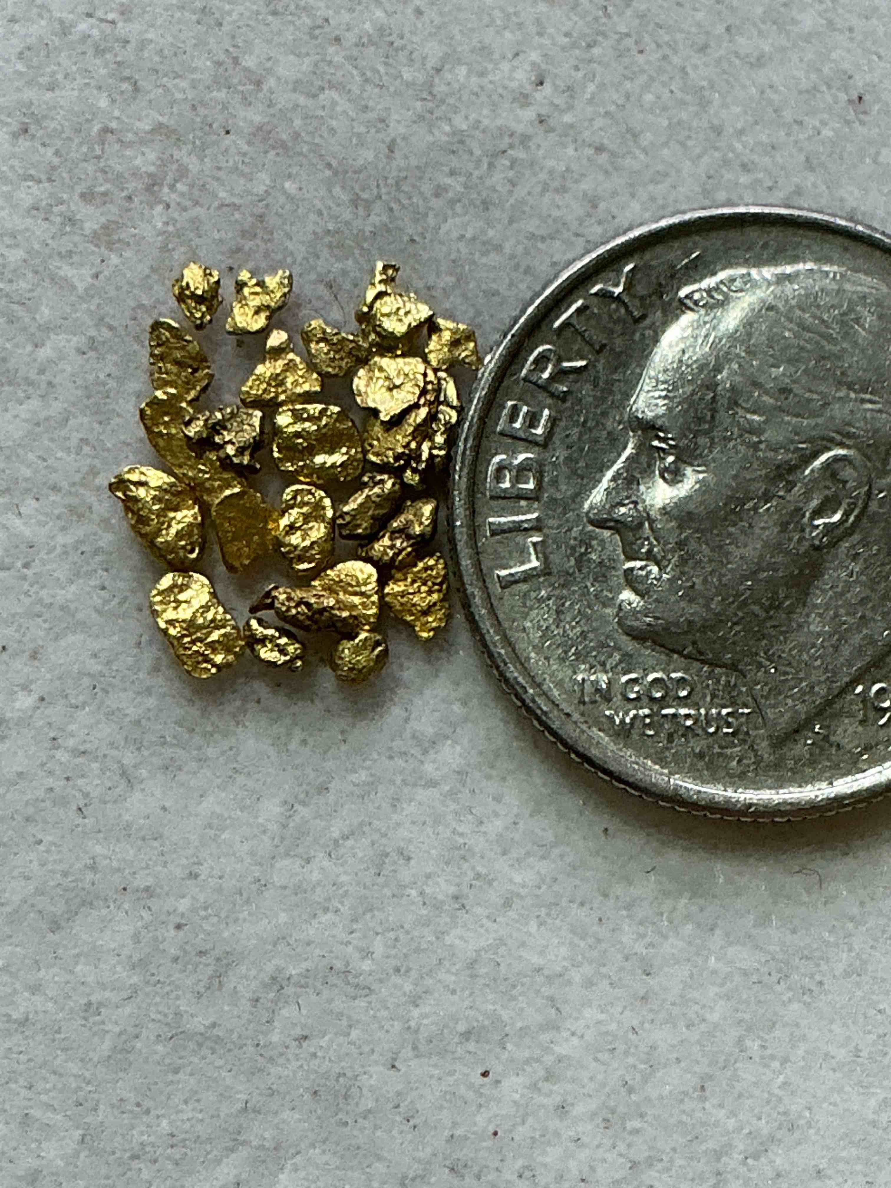 Condition photo showing New/Like New for genuine gold nuggets! gold nuggets fresh from prospecting north carolina mountains, total weight of all nuggets is approximately .5 grams. these gold nuggets typically test at between approx 22-24 karat. gold in raw, prospected form is extremely hard to find & much rarer than any refined form. get in on the gold craze... gold has increased in value over 40% since 2025! u.s. dime for size reference only (not included). gold vile in image included. own genuine, gold nuggets! 